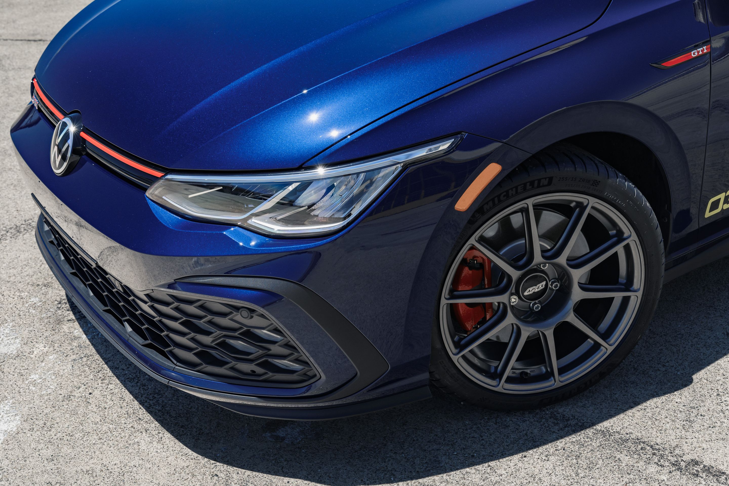 Blue VW MK8 GTI with 18" SM-10 Apex wheels in Anthracite