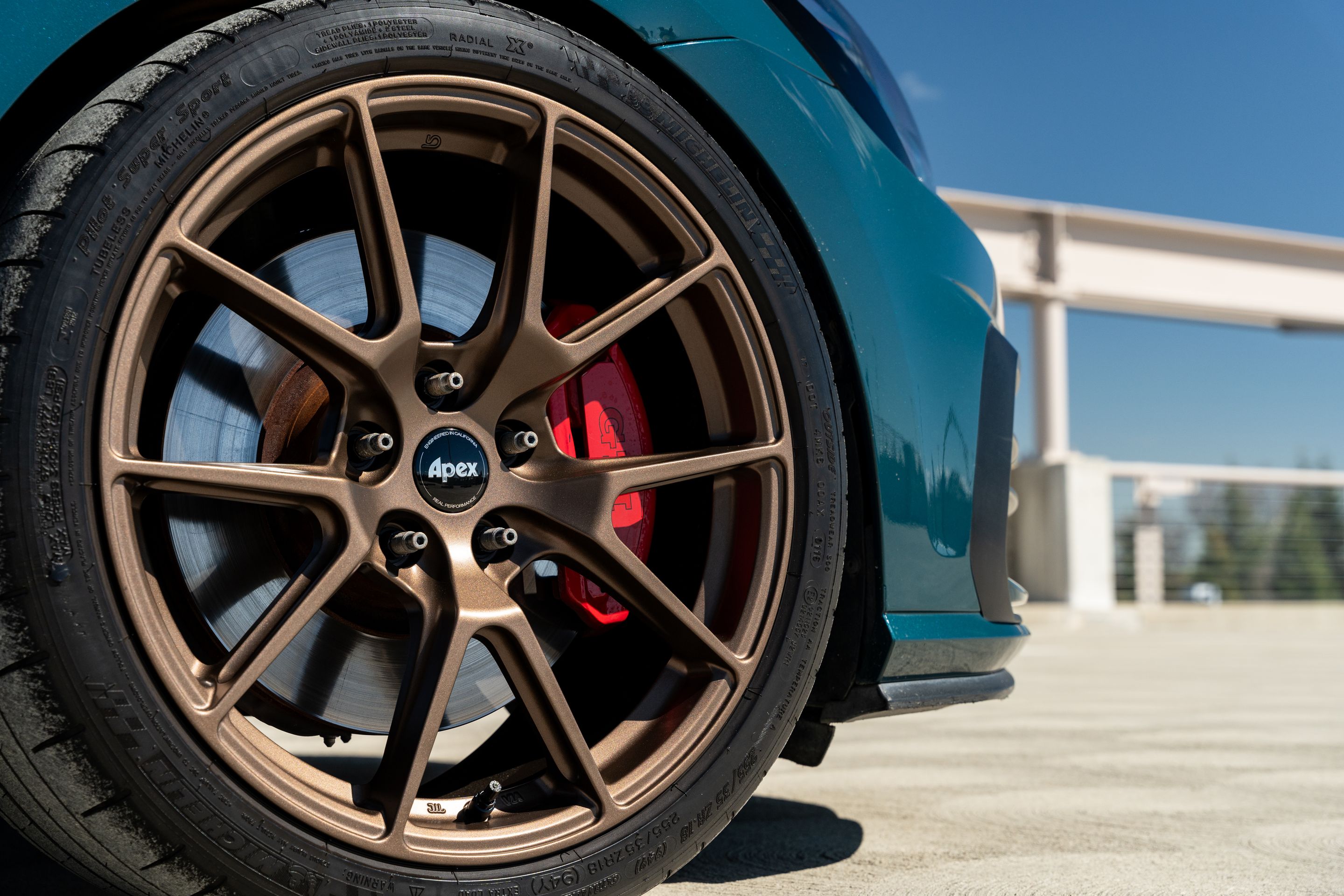 Green VW MK7 GTI with 18" VS-5 Apex wheels in Satin Bronze