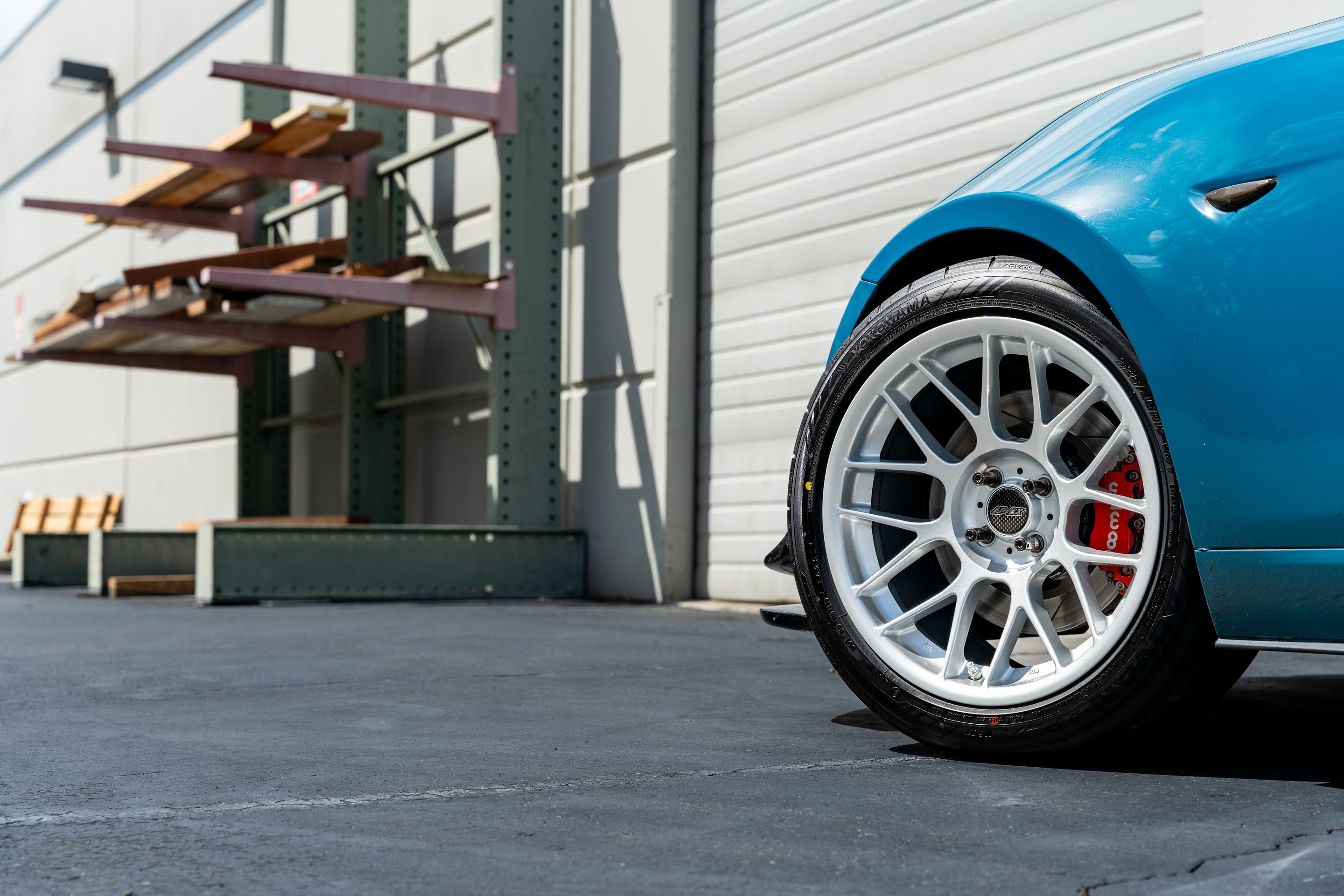 Blue Mazda ND MX-5 Miata with 17" ARC-8 Apex wheels in Race Silver