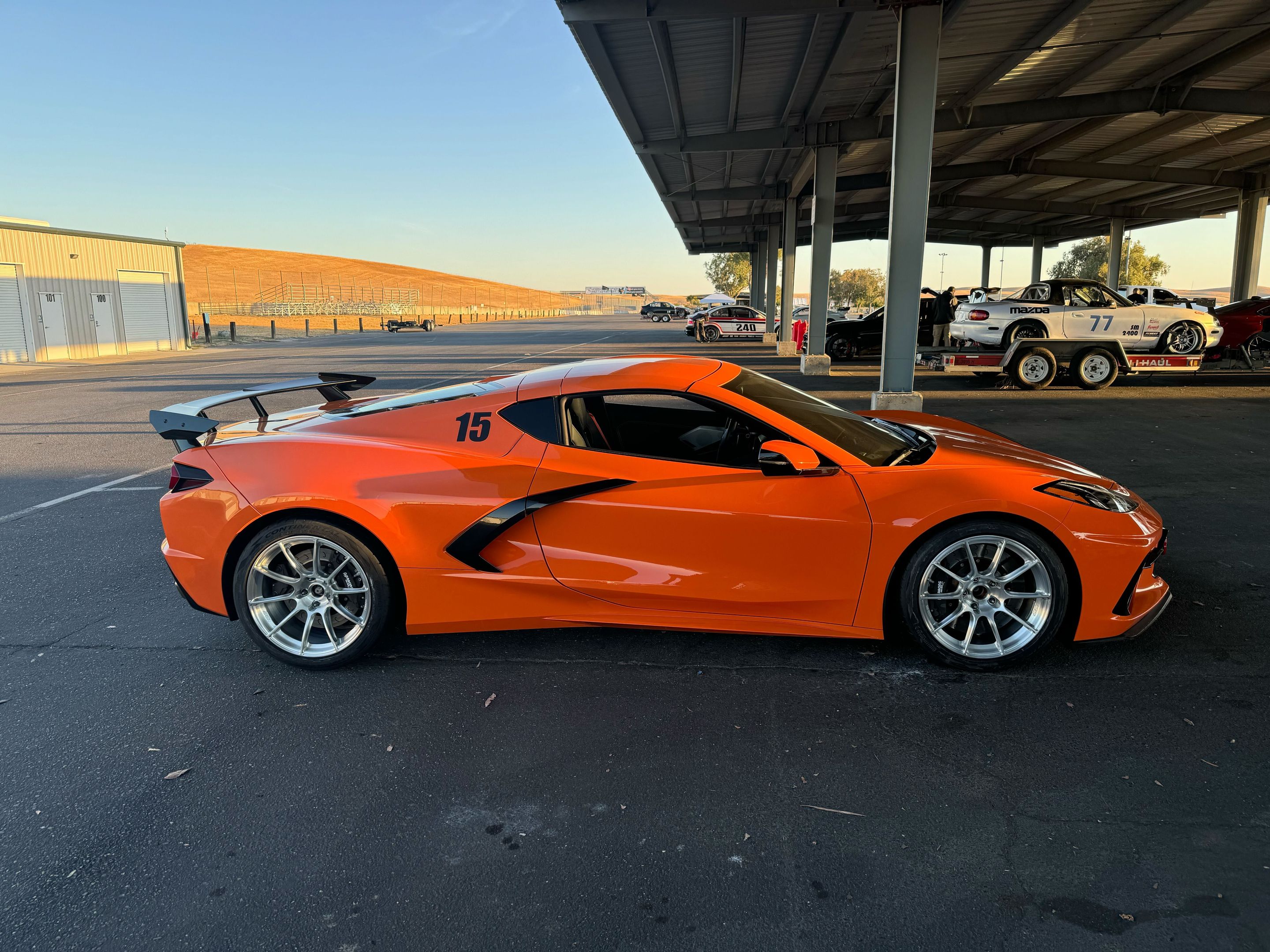Orange Chevrolet C8 Corvette Stingray/Z51 with 18"/19" SM-10RS Apex wheels in Brushed Clear