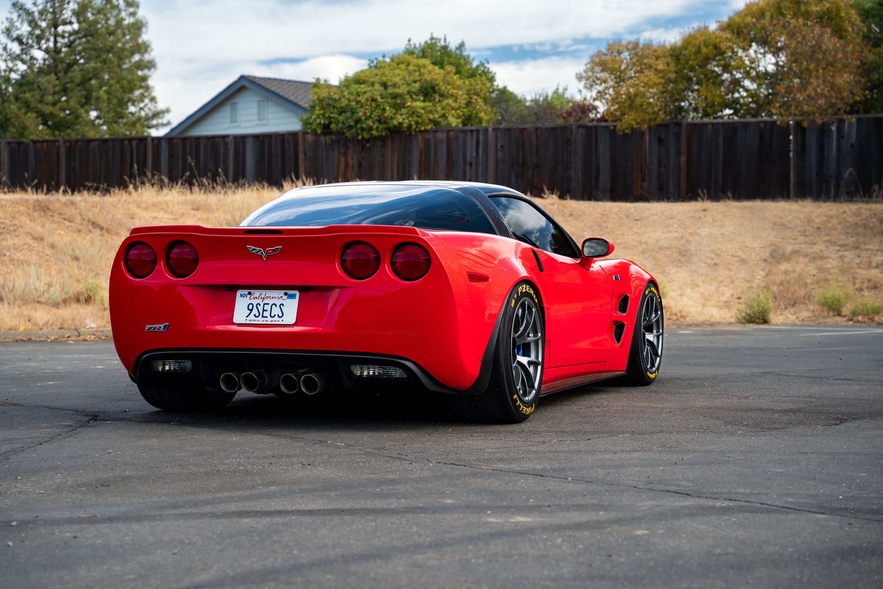 Red Chevrolet C6 Corvette ZR-1 with 18" VS-5RE Apex wheels in Anthracite