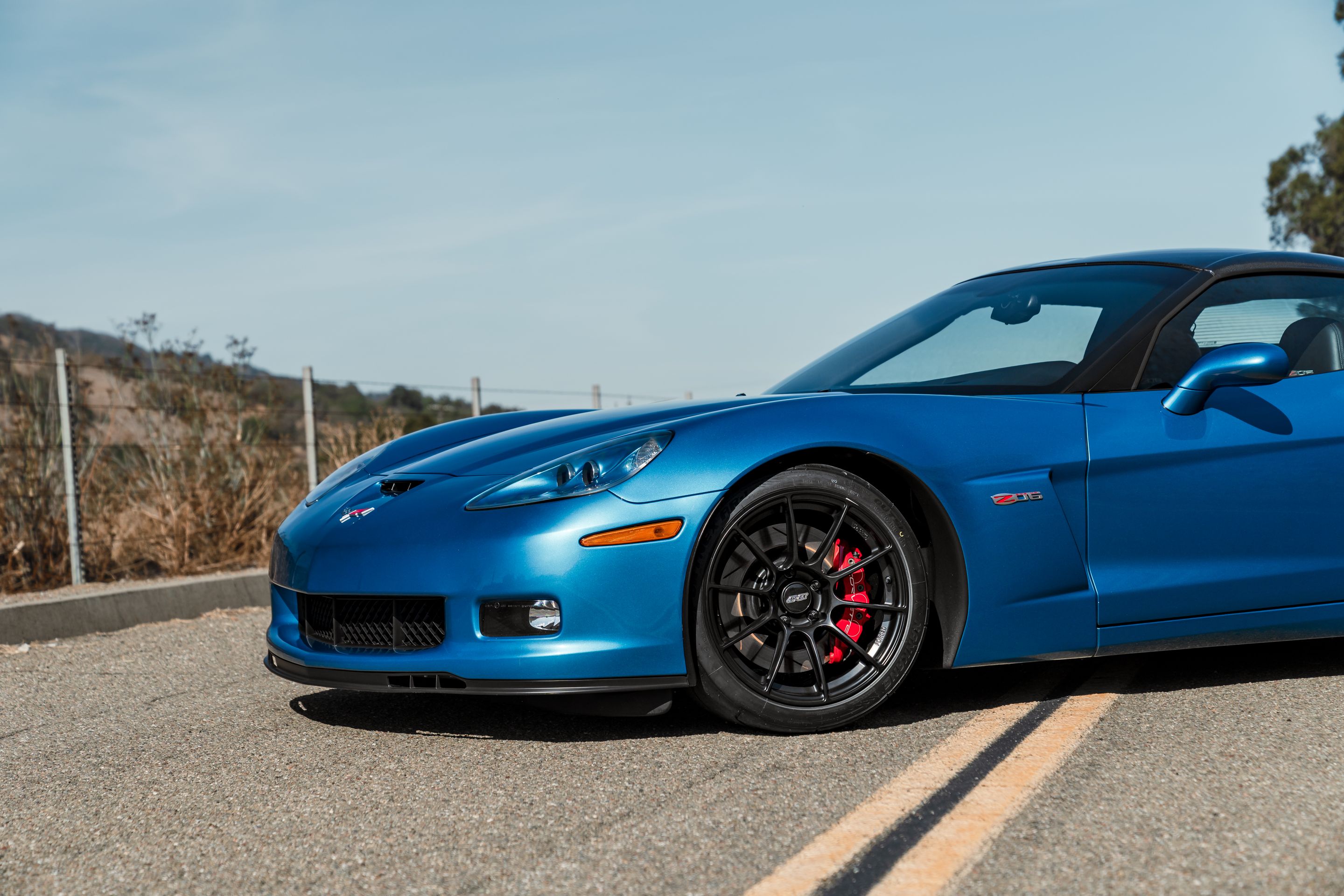 Blue Chevrolet C6 Corvette Z06 with 18" SM-10RS Apex wheels in Satin Black