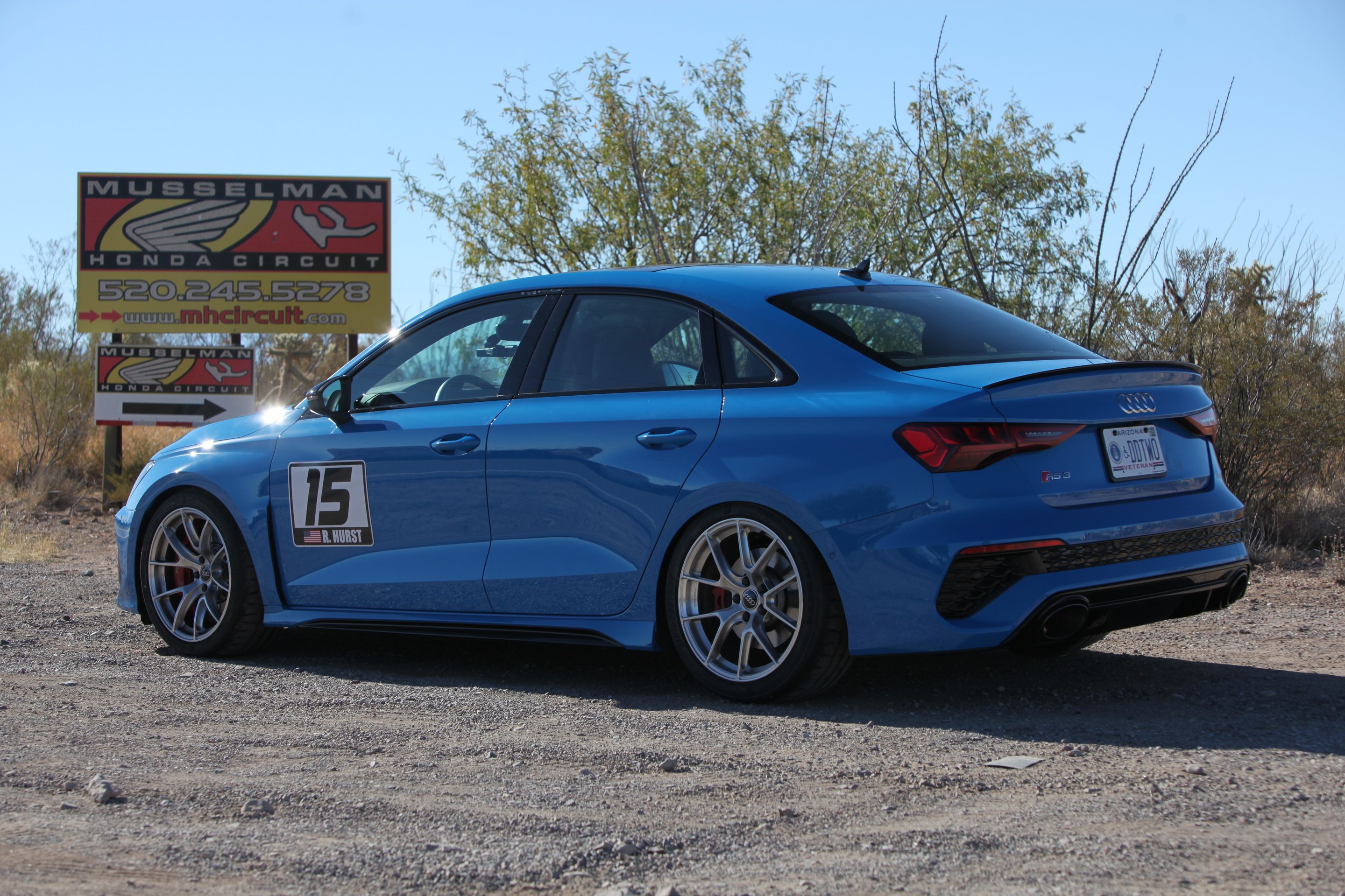 Blue Audi 8Y RS 3 with 18" VS-5RS Apex wheels in Brushed Clear