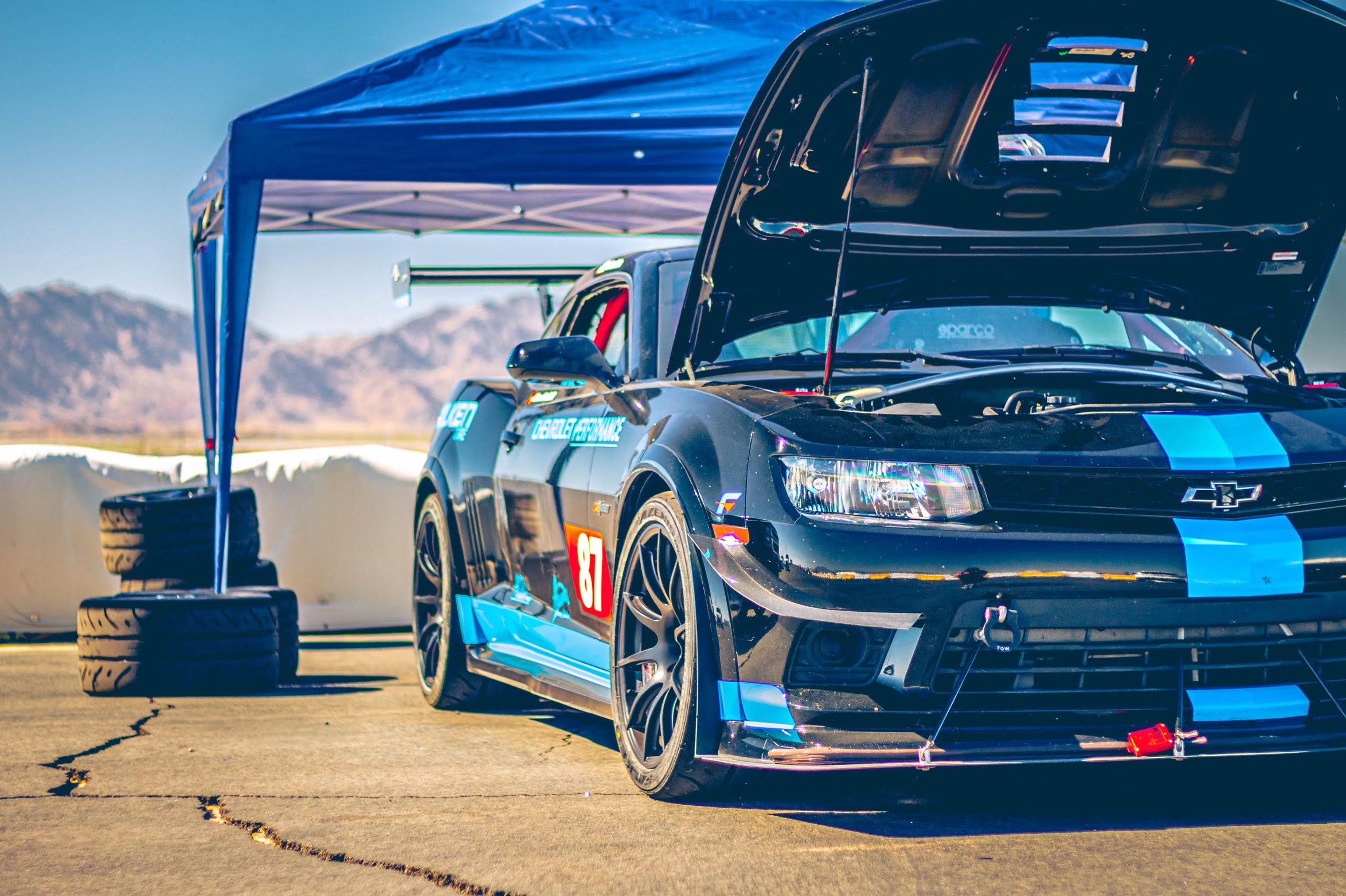 Black Chevrolet 5th Gen Camaro Z/28 with 19" SM-10 Apex wheels in Satin Black