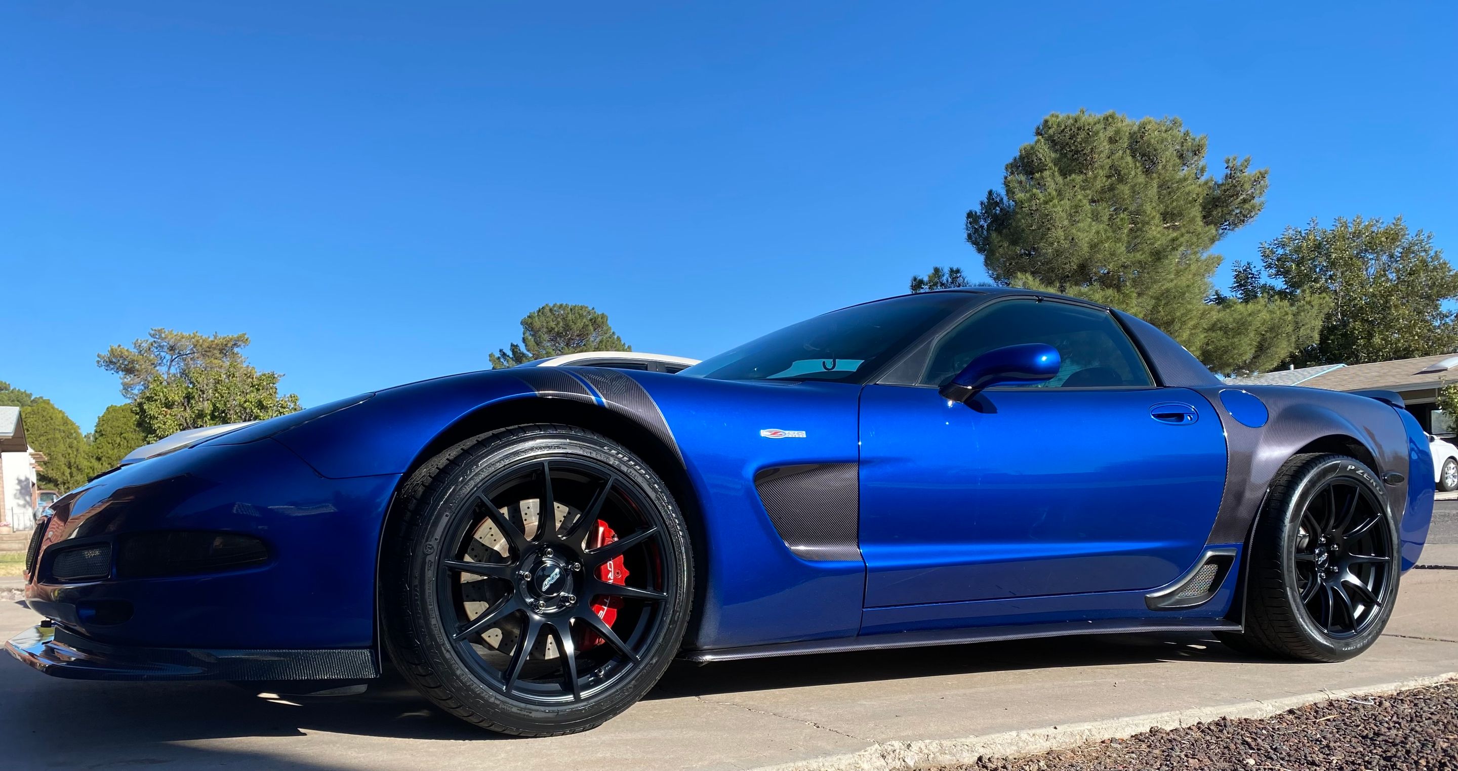 Blue Chevrolet C5 Corvette Z06 with 19" SM-10 Apex wheels in Satin Black