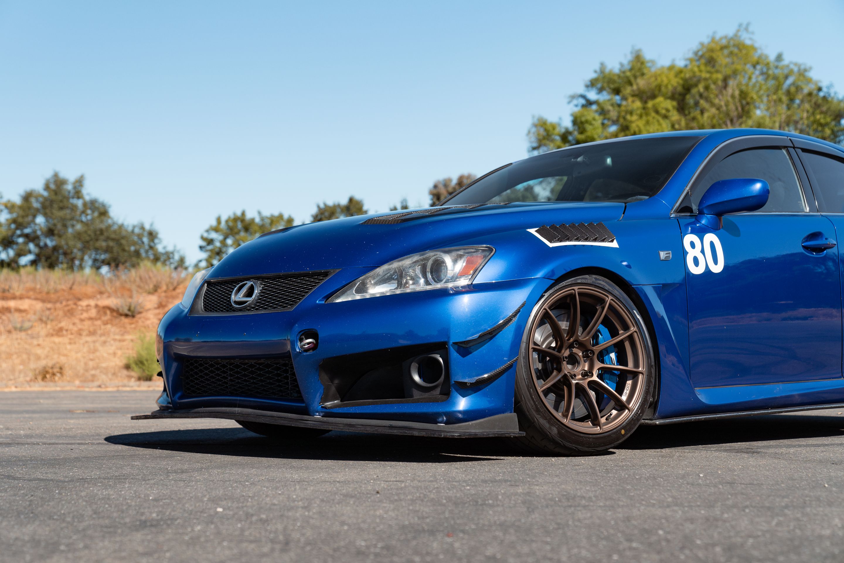 Blue Lexus USE20 IS-F with 18" SM-10RS Apex wheels in Satin Bronze