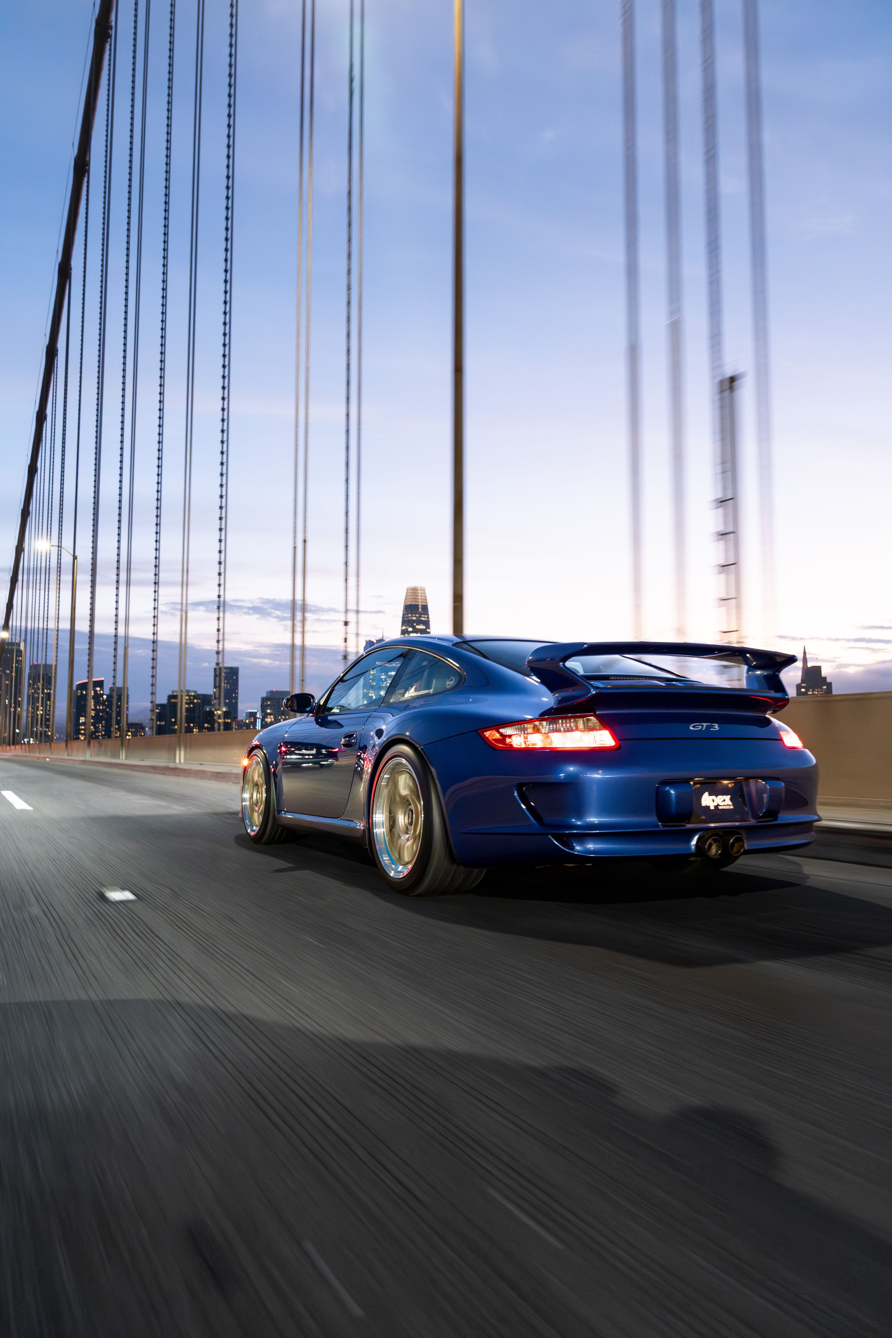 Blue Porsche 911 997 GT3 with 19" TEST-M Apex wheels in Machined Lip Gloss Motorsport Gold