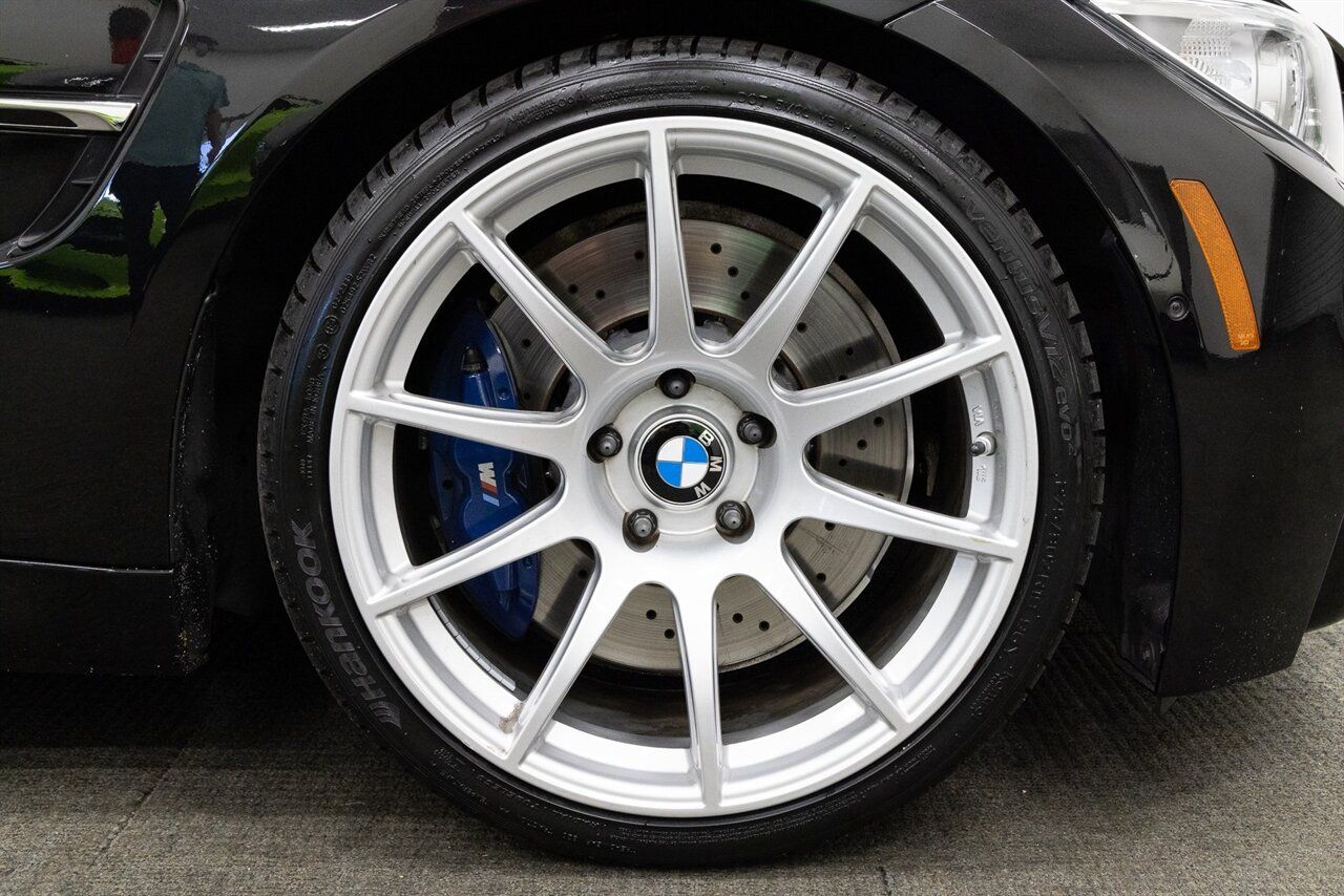 Black BMW F80 M3 with 19" SM-10 Apex wheels in Race Silver