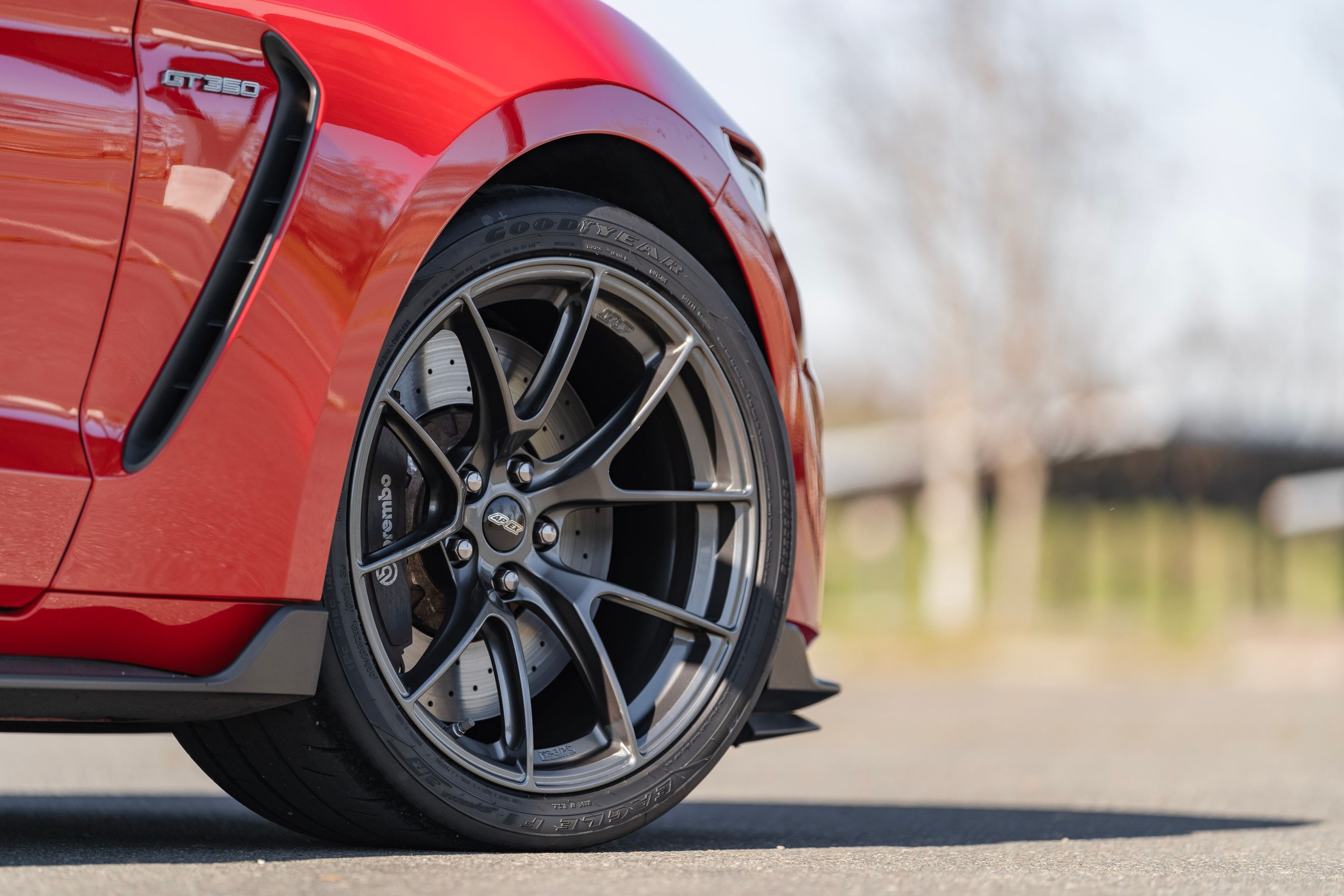 Red Ford S550 Mustang GT350 with 19" VS-5RS Apex wheels in Anthracite