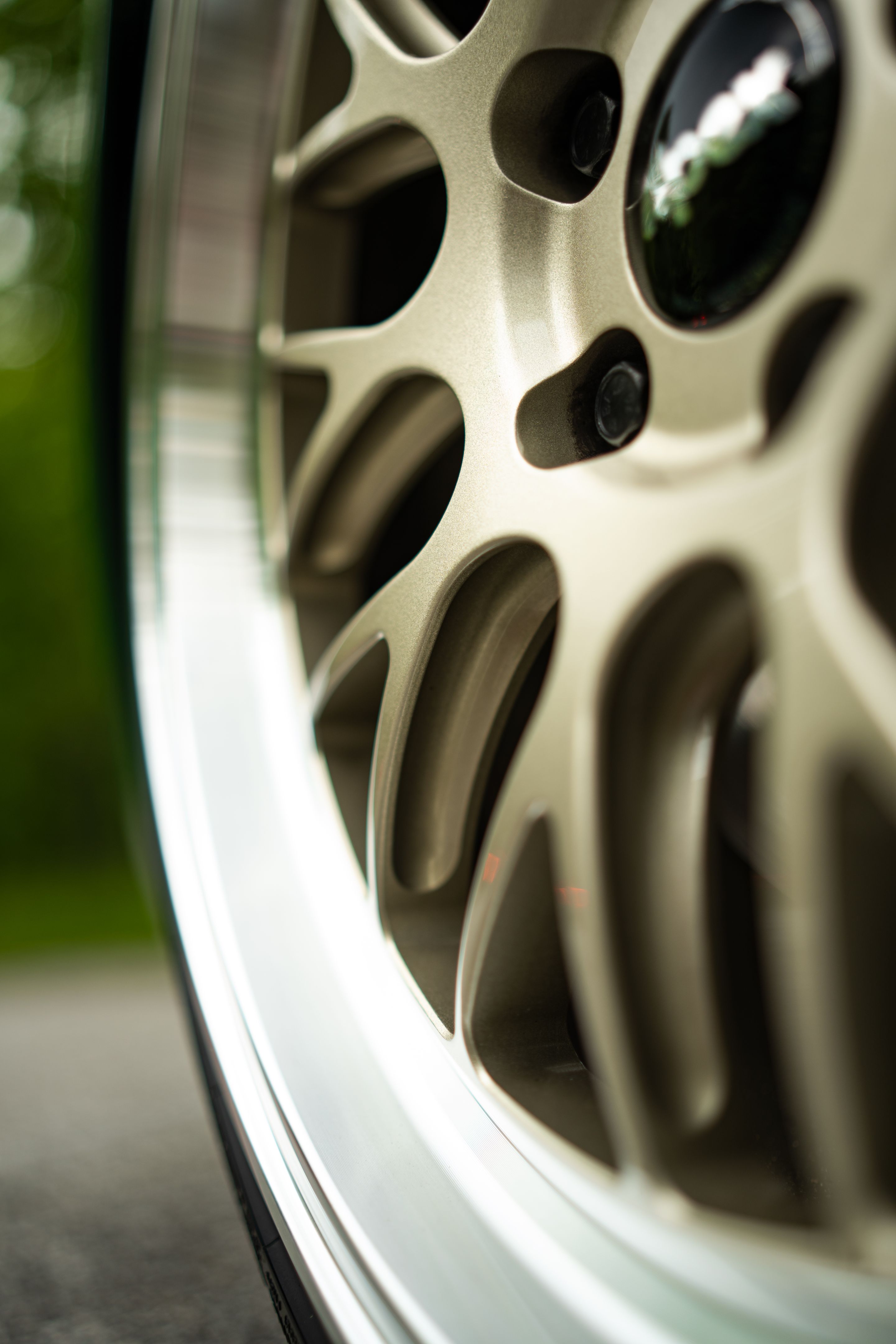 Green Audi B5 S4 Avant/Wagon with 18" ML-10RT Apex wheels in Machined Lip Gloss Motorsport Gold