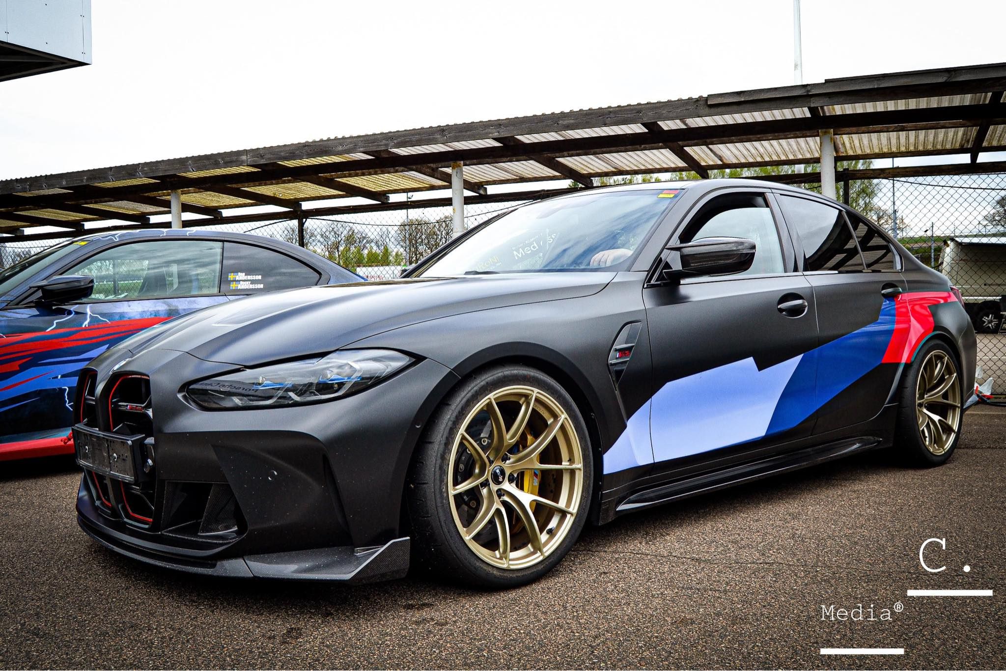 Black BMW G80 M3 with 19" VS-5RS Apex wheels in Motorsport Gold