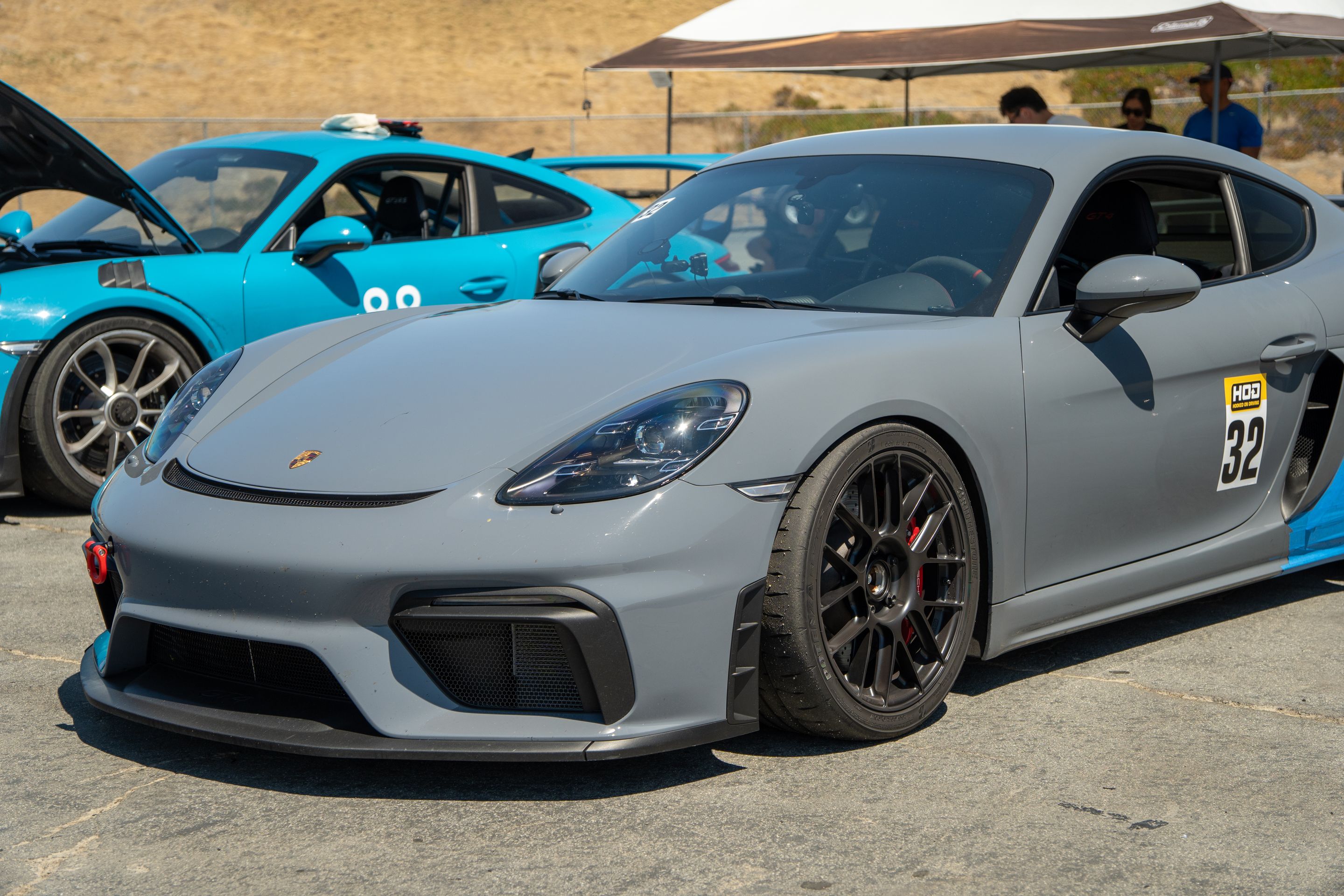Grey Porsche 718 Cayman GT4 with 19" EC-7RS Apex wheels in Satin Black