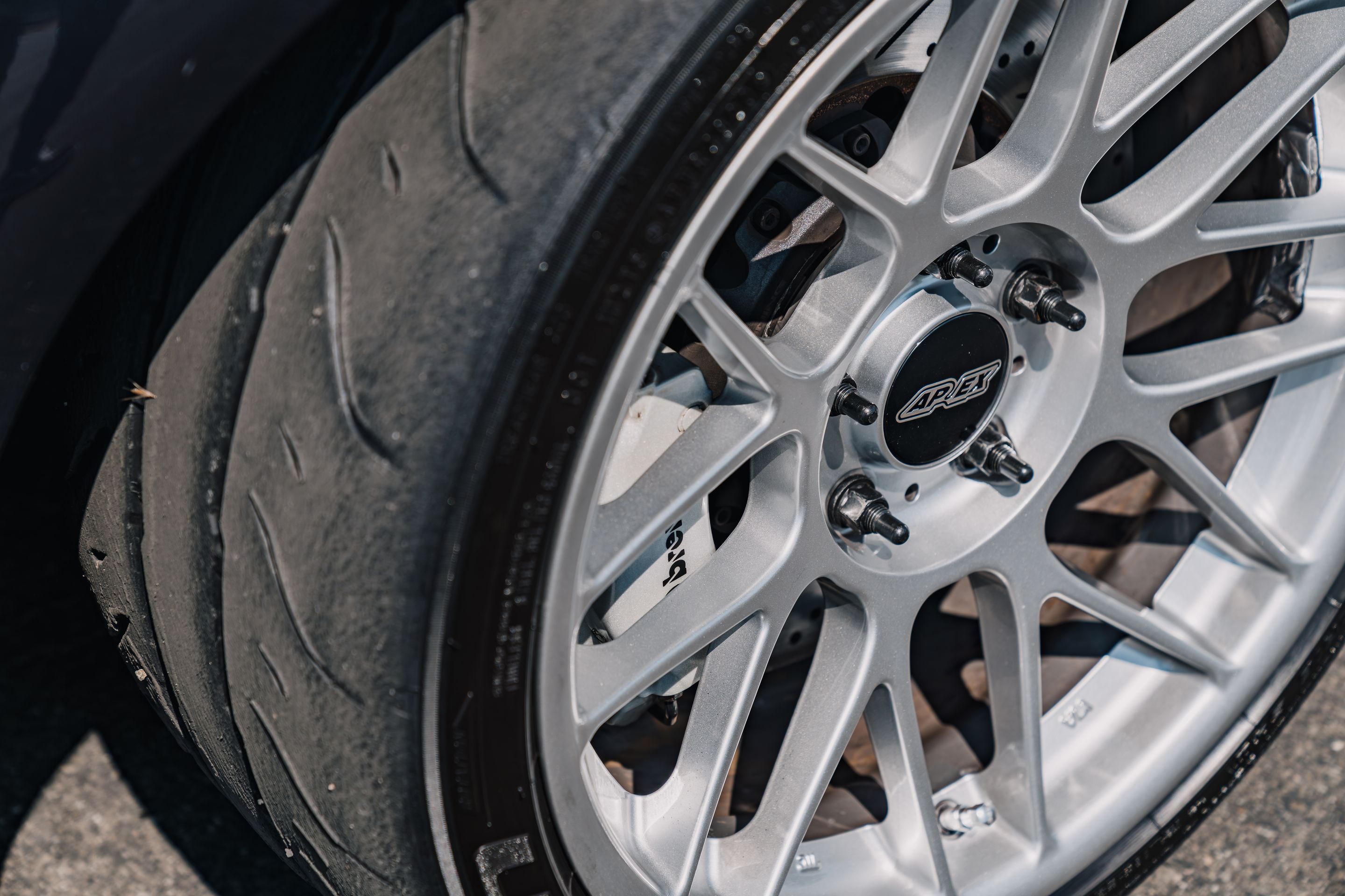 Black BMW E46 M3 with 18" ARC-8 Apex wheels in Hyper Silver