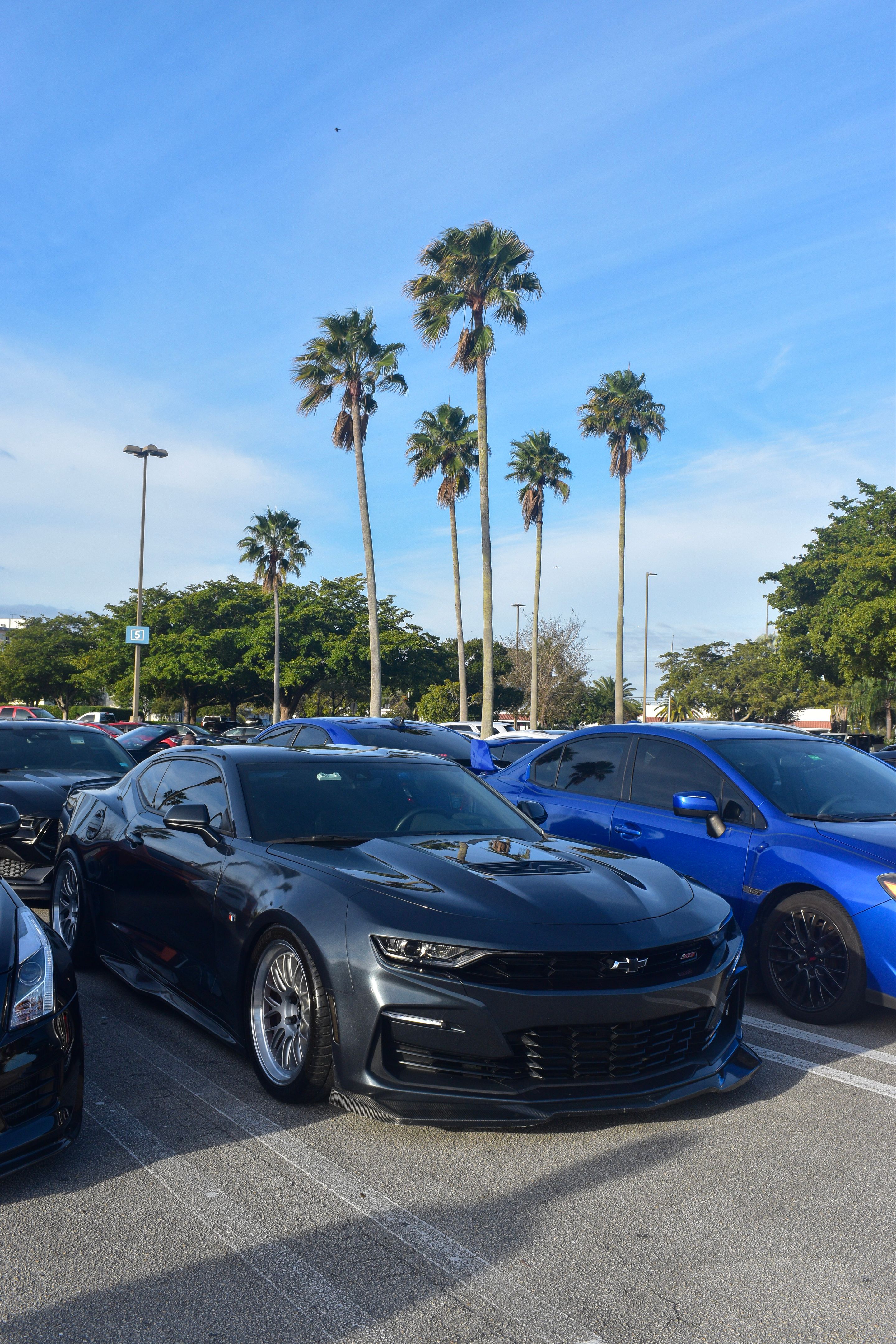 Grey Chevrolet 6th Gen Camaro SS with 19" ML-10RT Apex wheels in Machined Lip Race Silver