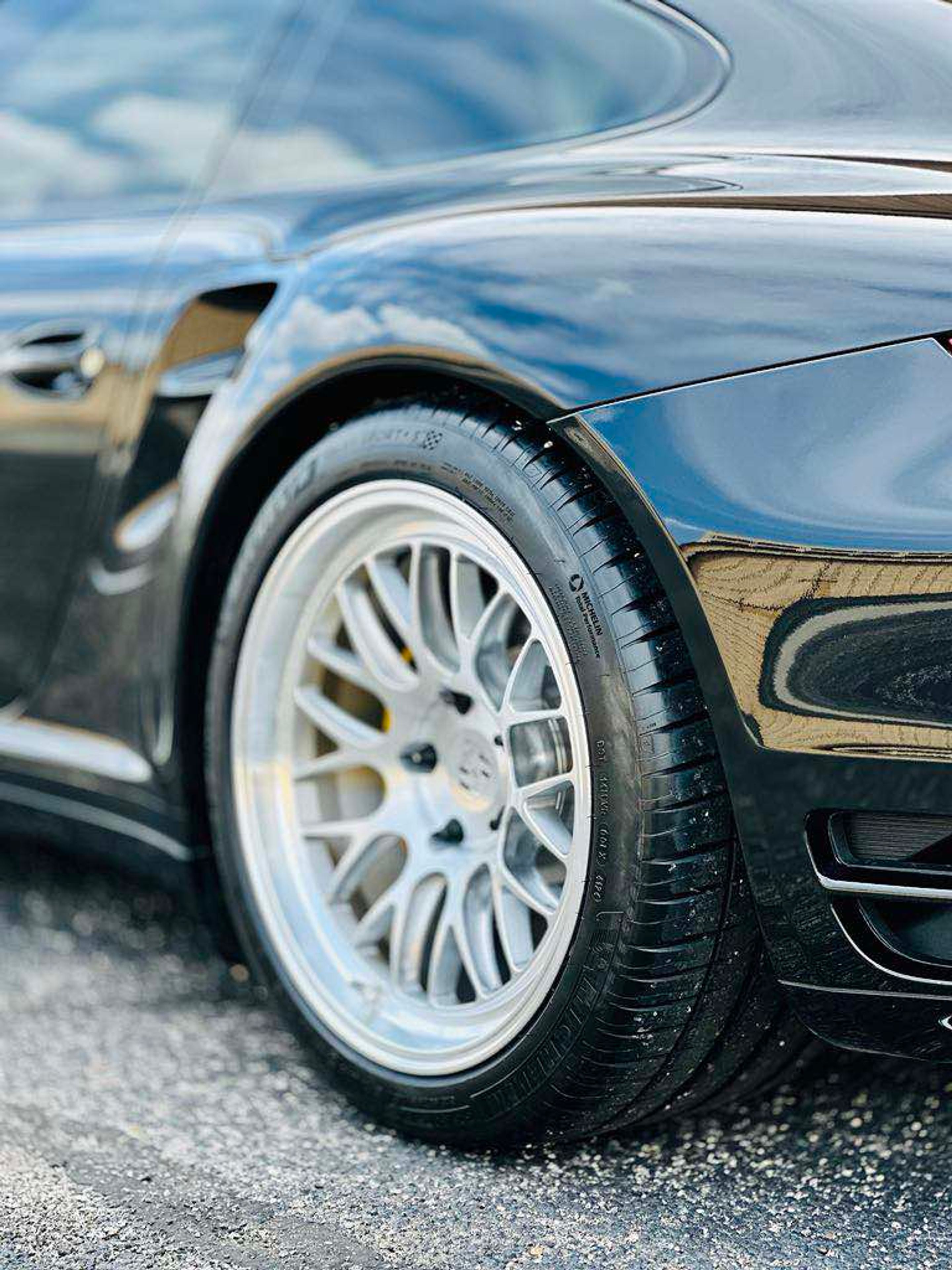 Black Porsche 911 997 Turbo with 19" ML-10RT Apex wheels in Machined Lip Brushed Clear