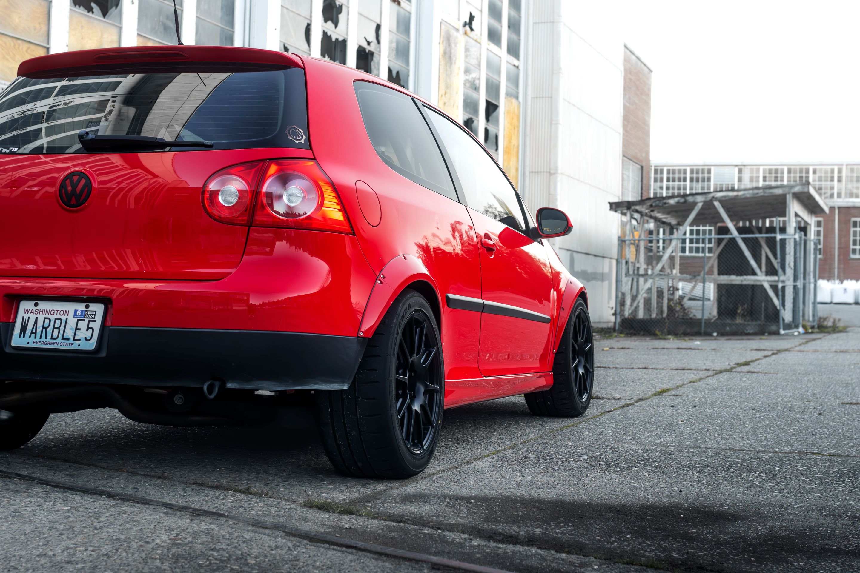 Red VW MK5 Golf with 17" SM-10 Apex wheels in Satin Black