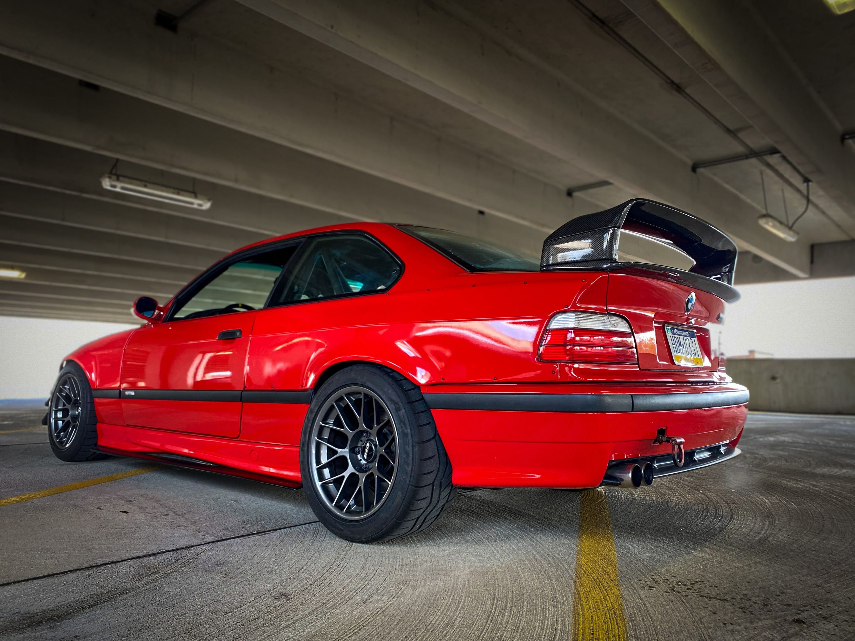 Red BMW E36 M3 with 17" ARC-8 Apex wheels in Anthracite