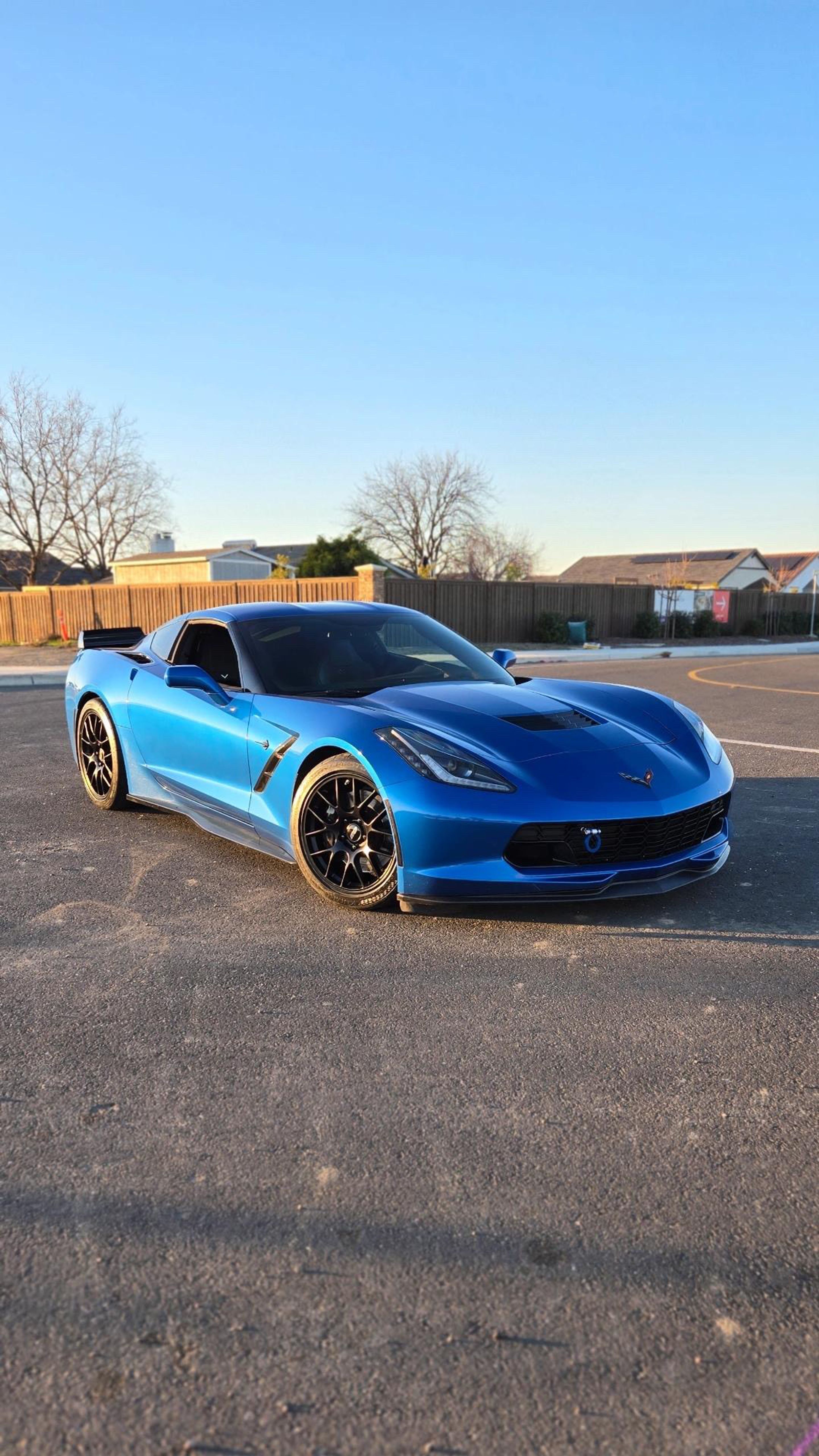 Blue Chevrolet C7 Corvette Stingray/Z51 with 18"/19" EC-7 Apex wheels in Satin Black