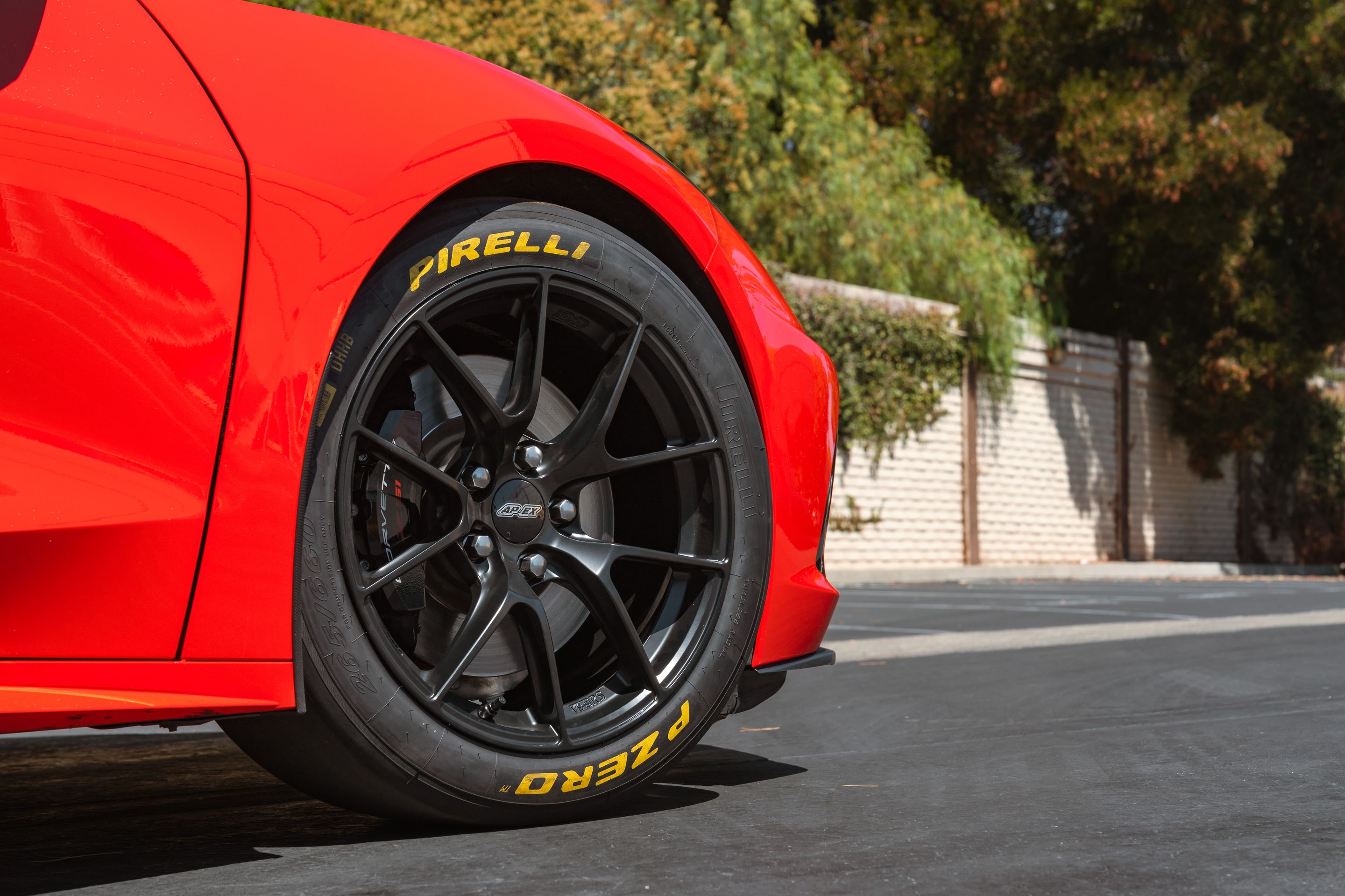 Red Chevrolet C8 Corvette Stingray/Z51 with 18" VS-5RS Apex wheels in Satin Black