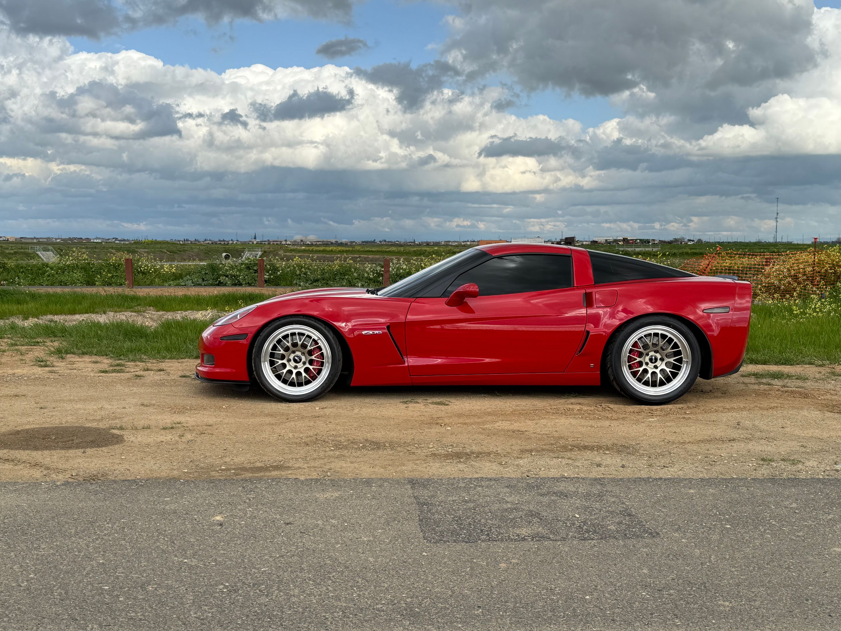 Red Chevrolet C6 Corvette Z06 with 19" ML-10RT Apex wheels in Machined Lip Gloss Motorsport Gold