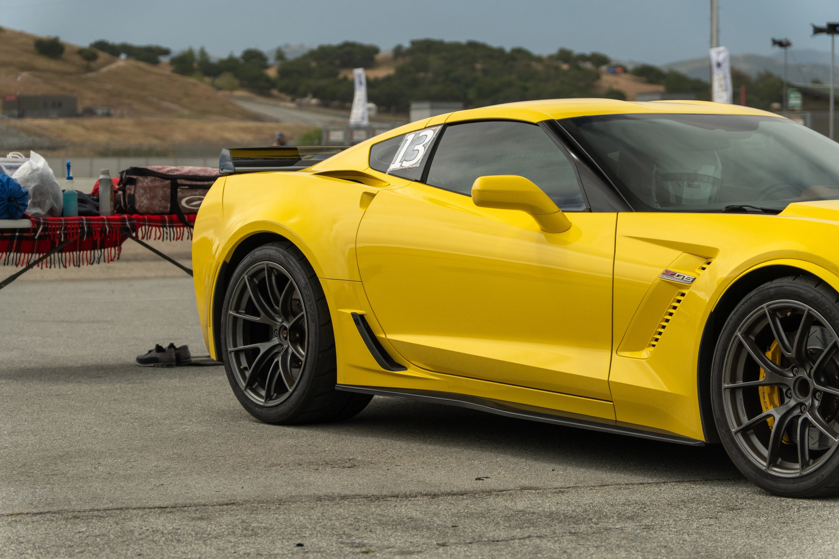 Yellow Chevrolet C7 Corvette Z06 with 19"/20" VS-5RS Apex wheels in Anthracite