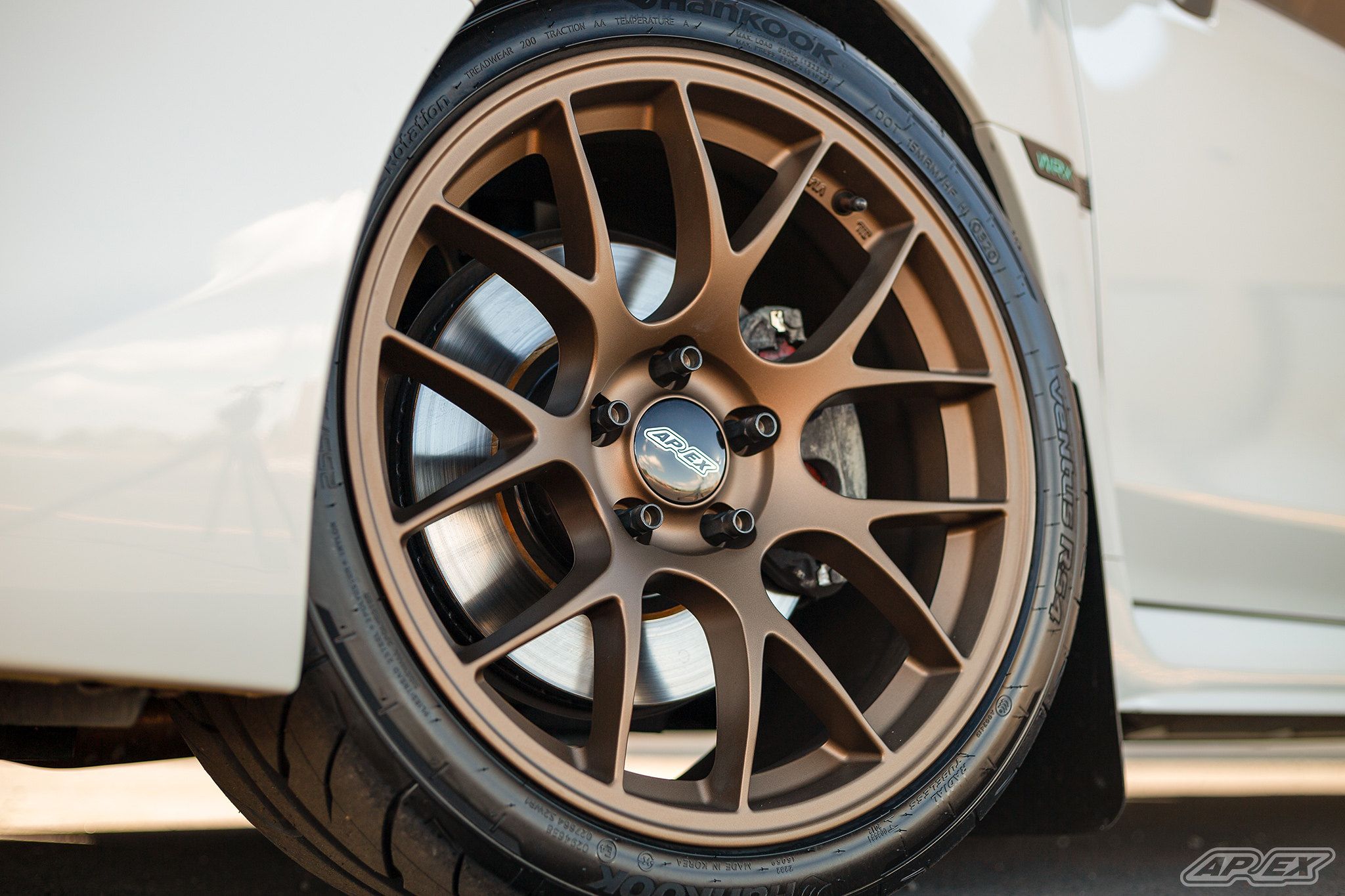 White Subaru VA WRX with 18" EC-7 Apex wheels in Satin Bronze