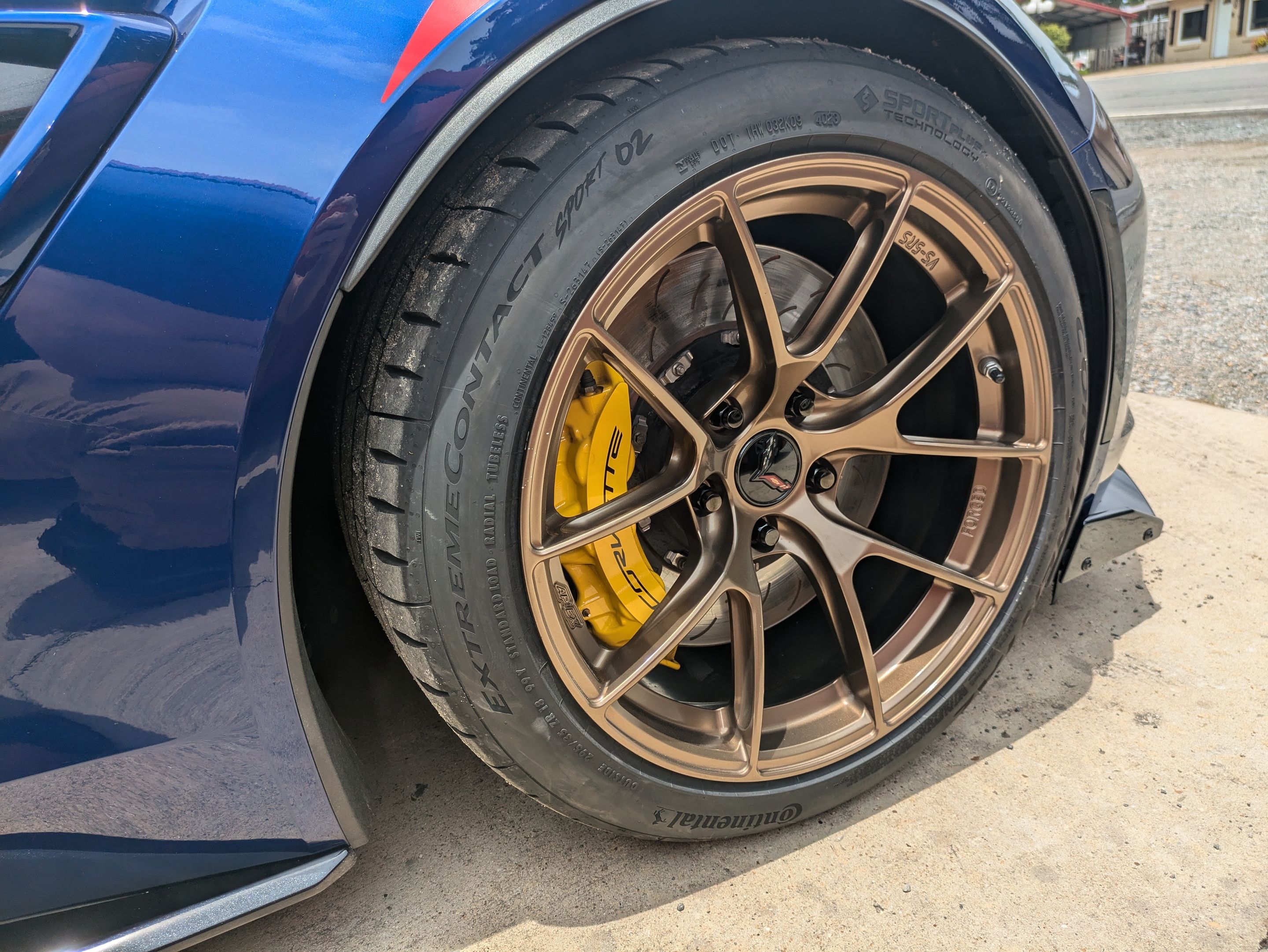 Blue Chevrolet C7 Corvette Grand Sport with 18"/19" VS-5RS Apex wheels in Satin Bronze
