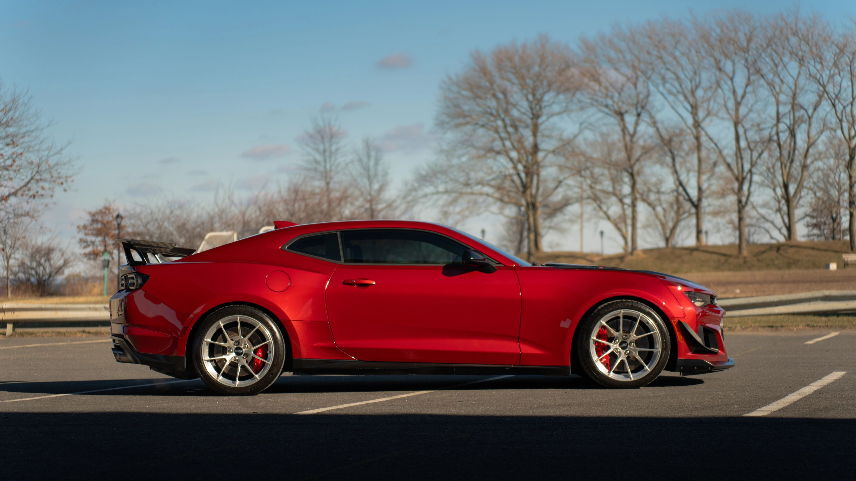 Red Chevrolet 6th Gen Camaro ZL1 with 19" VS-5RS Apex wheels in Brushed Clear