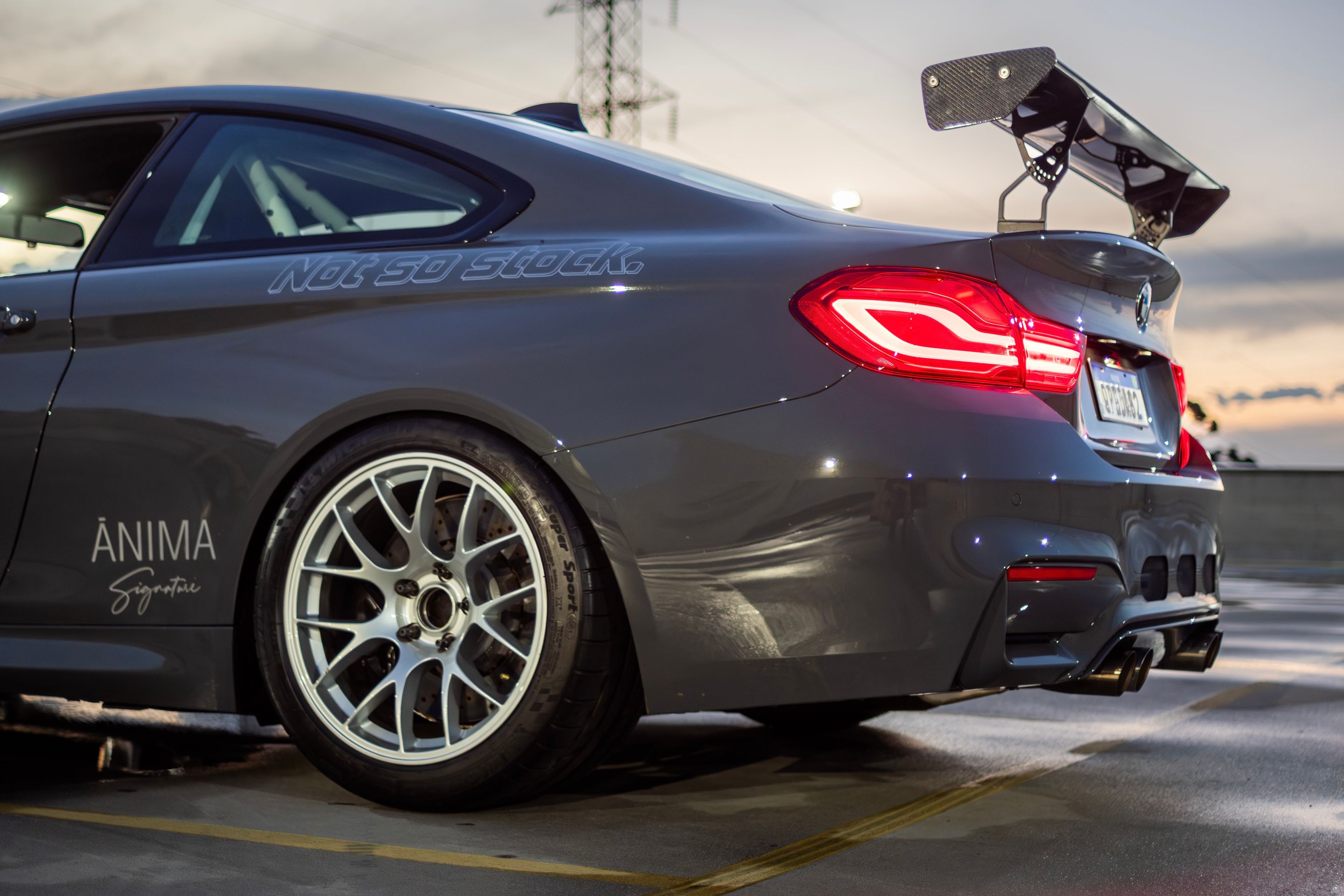 Grey BMW F82 Coupe M4 with 18" EC-7 Apex wheels in Race Silver