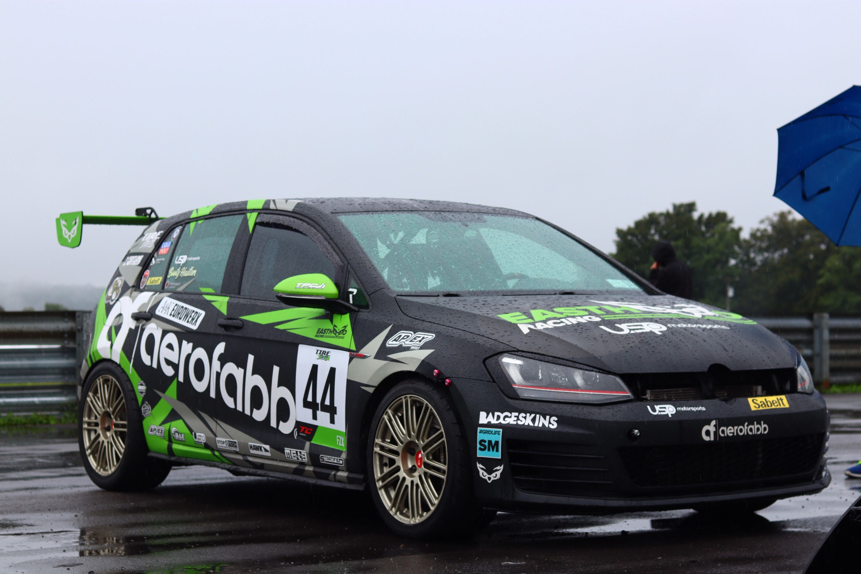 Race Livery VW MK7 GTI with 18" TC-10RT Apex wheels in Motorsport Gold