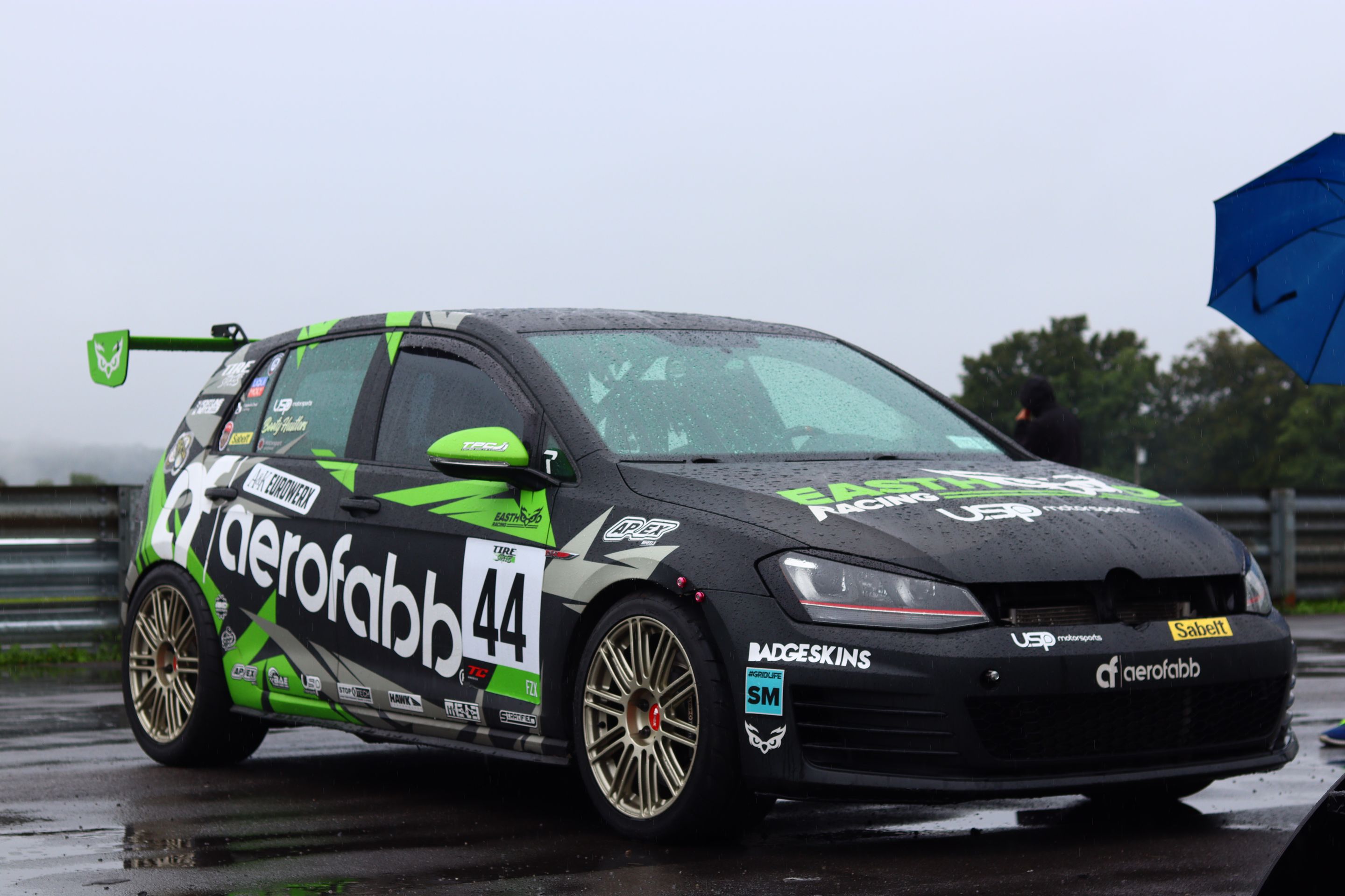 Race Livery VW MK7 GTI with 18" TC-10RT Apex wheels in Motorsport Gold