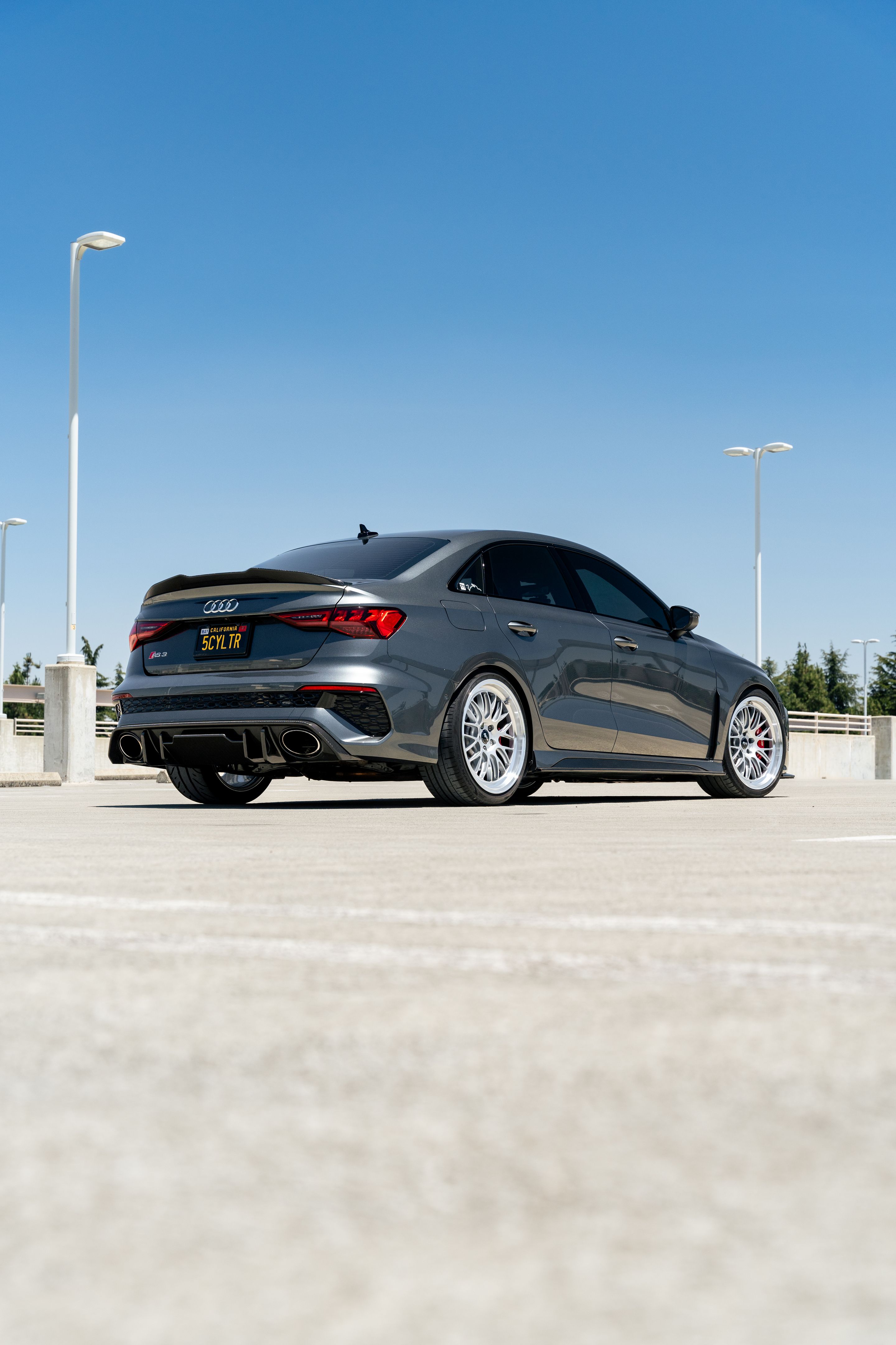 Grey Audi 8Y RS 3 with 19" ML-10RT Apex wheels in Machined Lip Race Silver