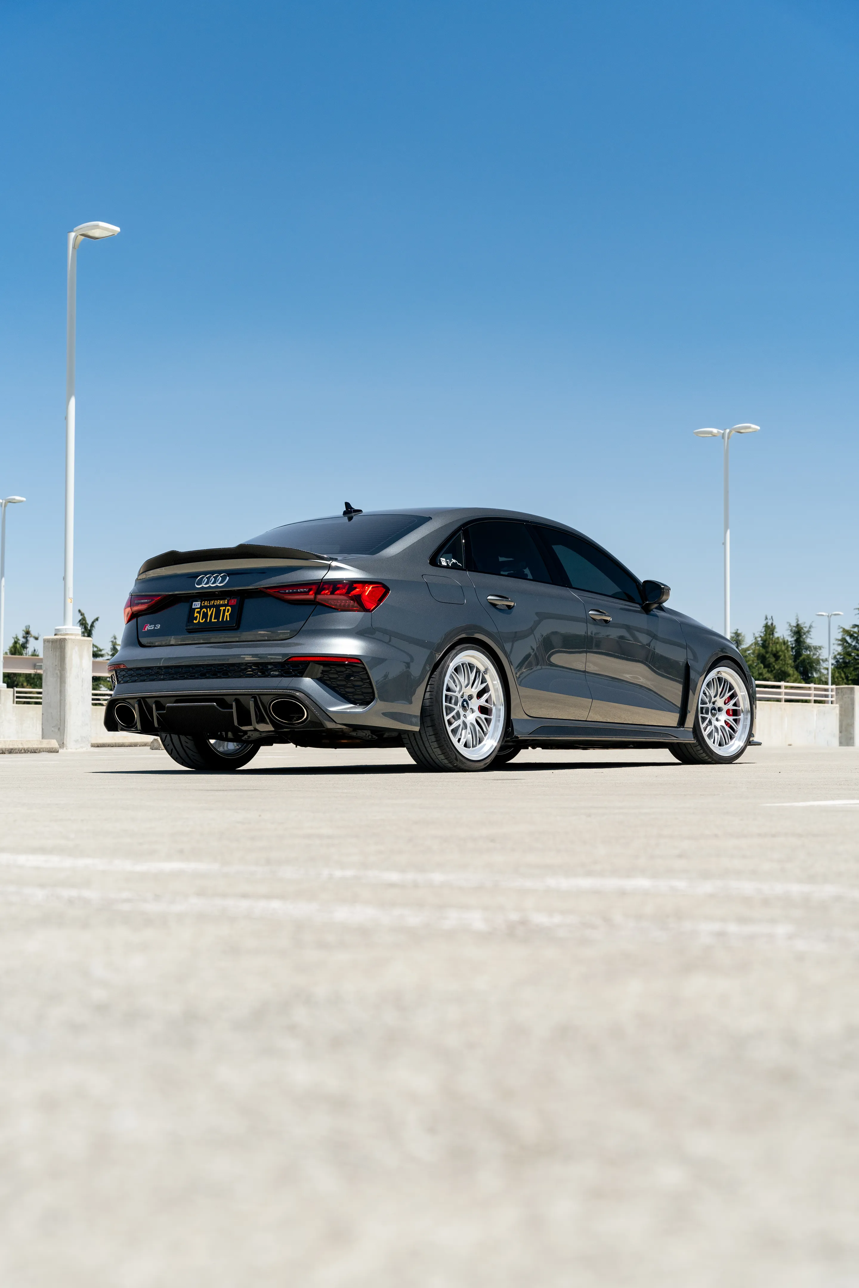 Grey Audi 8Y RS 3 with 19" ML-10RT Apex wheels in Machined Lip Race Silver