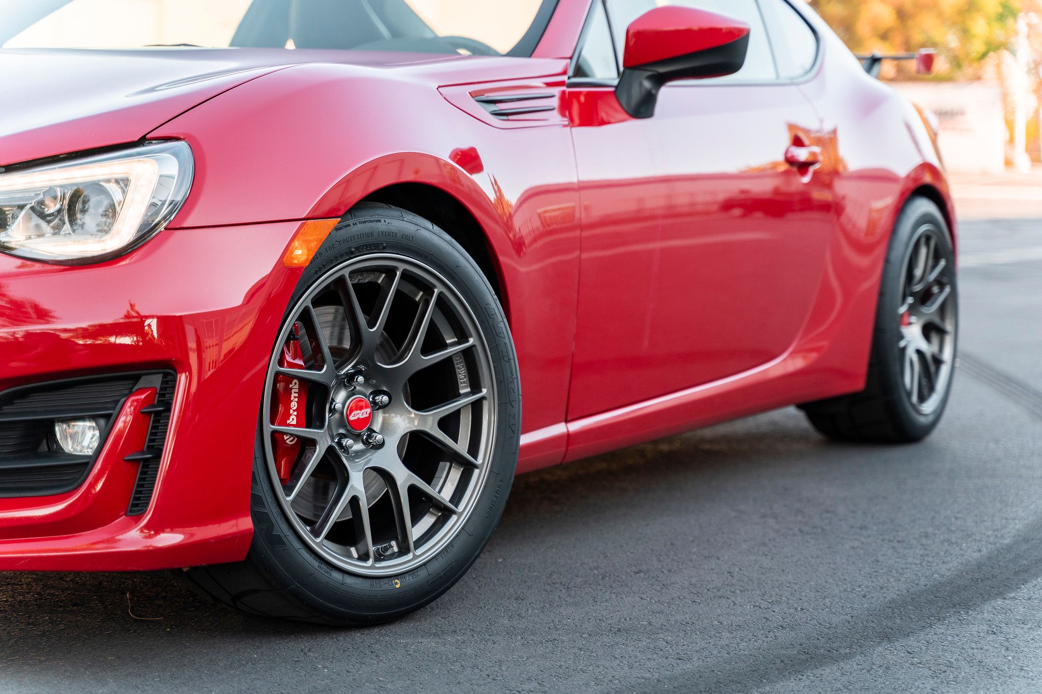 Red Subaru ZC6 / Gen 1 BRZ with 17" EC-7R Apex wheels in Anthracite