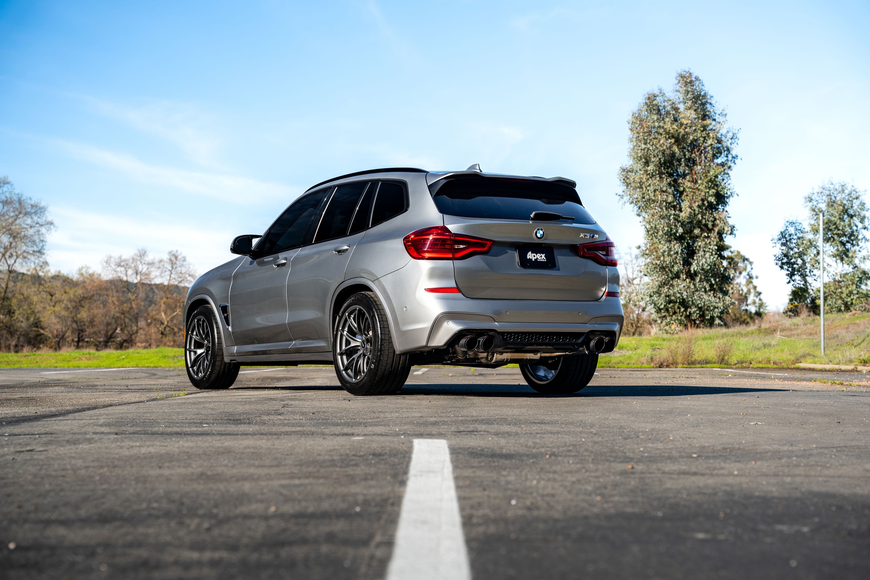 Silver BMW F97 X3M with 20" VS-5RX Apex wheels in Anthracite