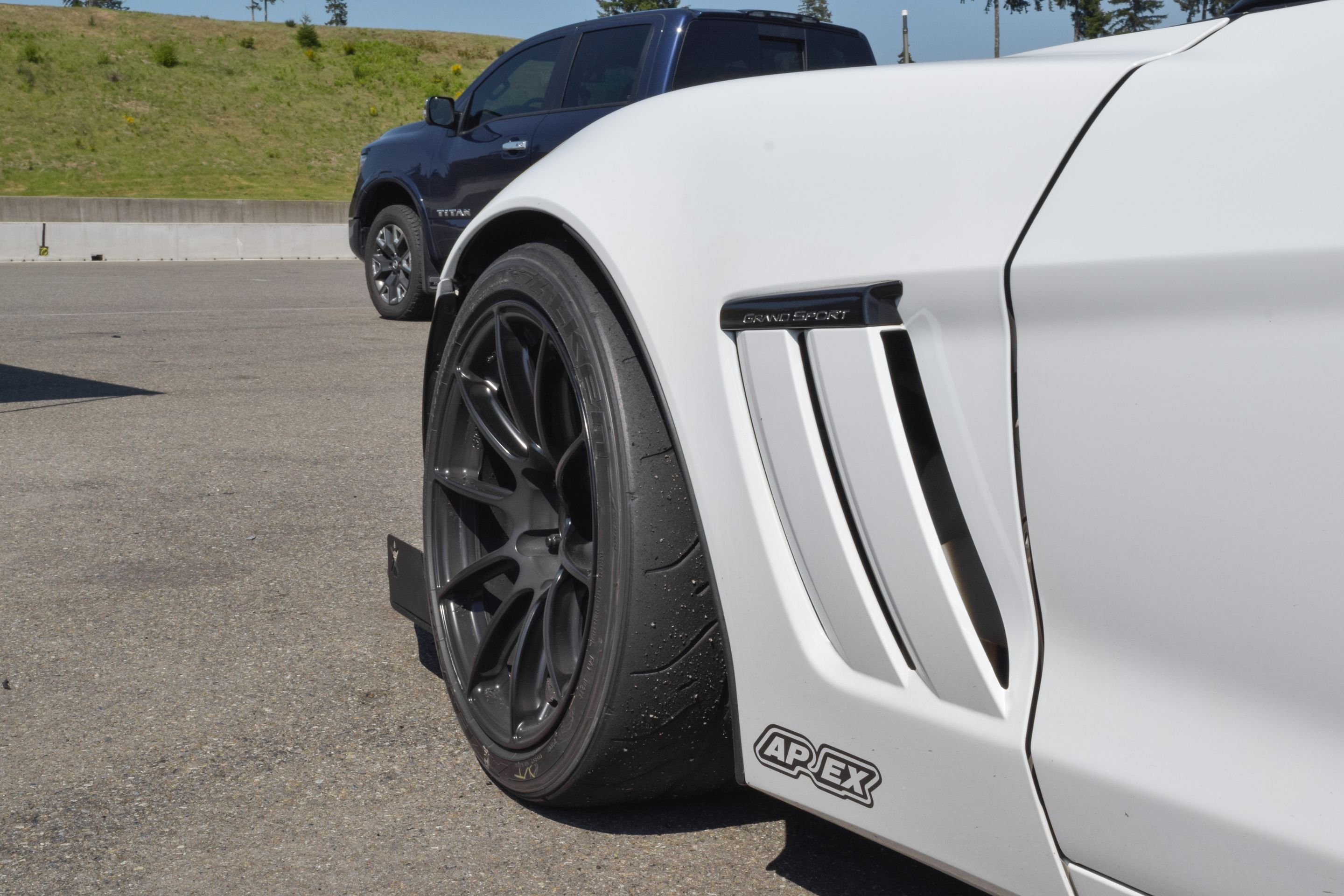 White Chevrolet C6 Corvette Grand Sport with 18"/19" SM-10RS Apex wheels in Satin Black