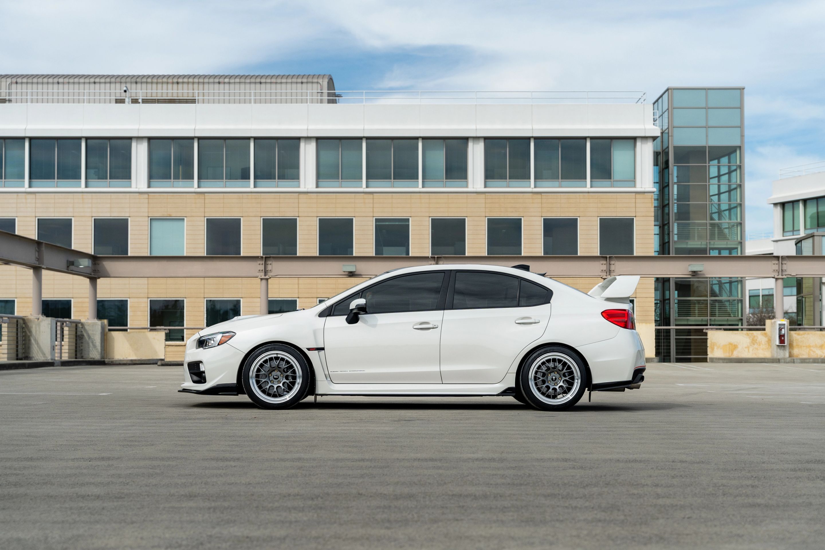 White Subaru VA WRX STI with 18" ML-10RT Apex wheels in Machined Lip Anthracite