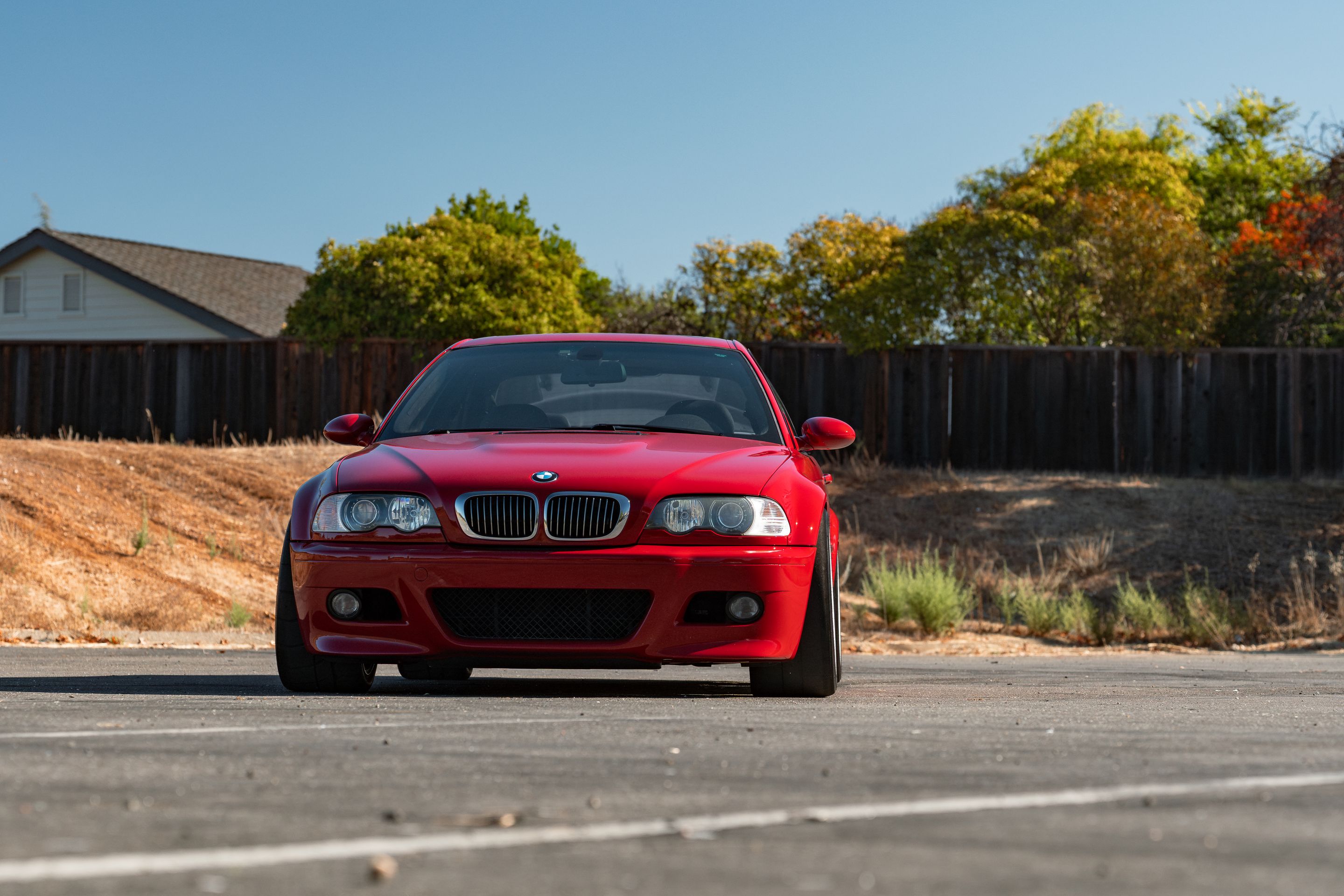Red BMW E46 M3 with 18" ARC-8RT Apex wheels in Race Silver