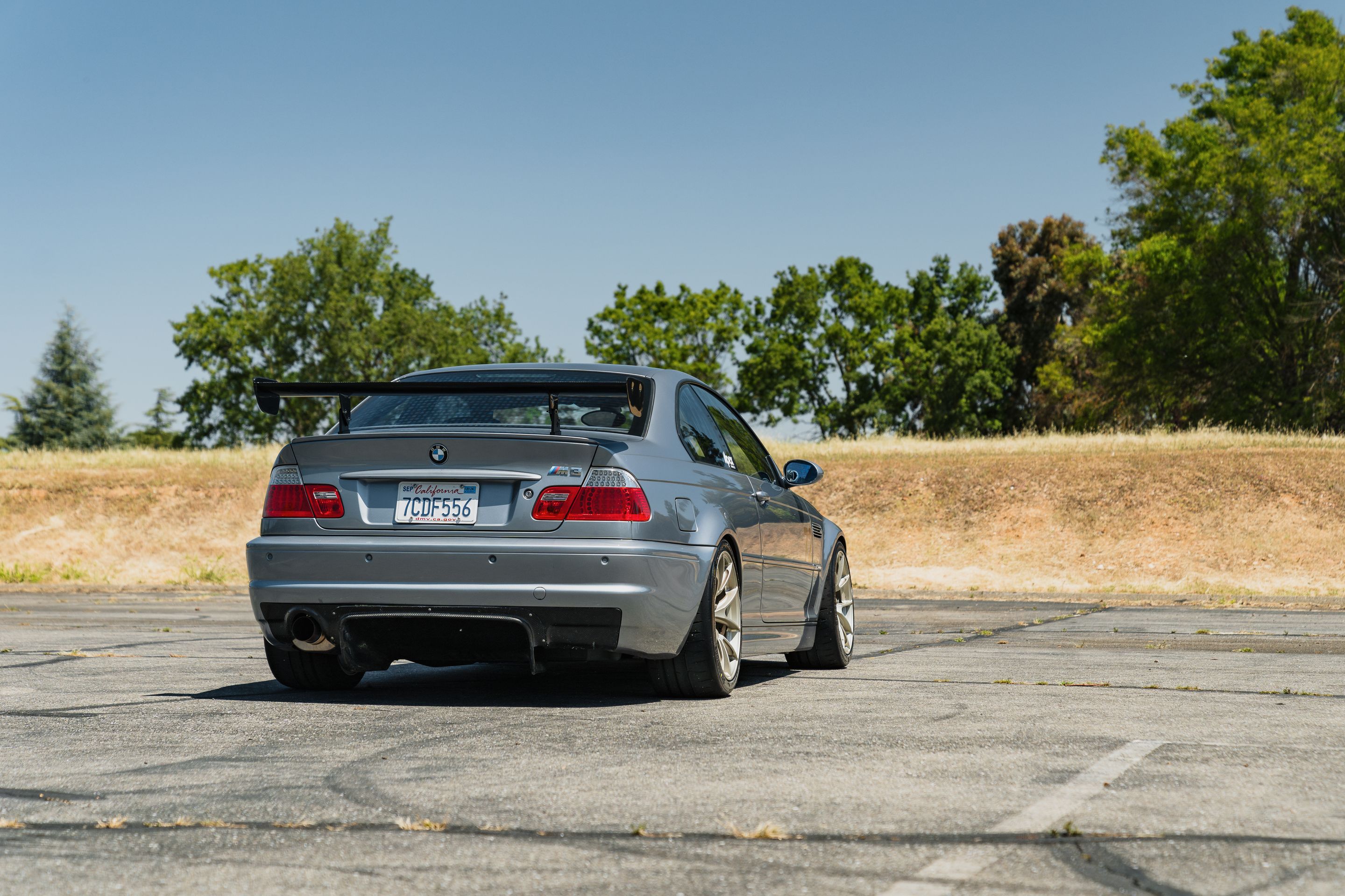 Grey BMW E46 M3 with 18" VS-5RS Apex wheels in Motorsport Gold