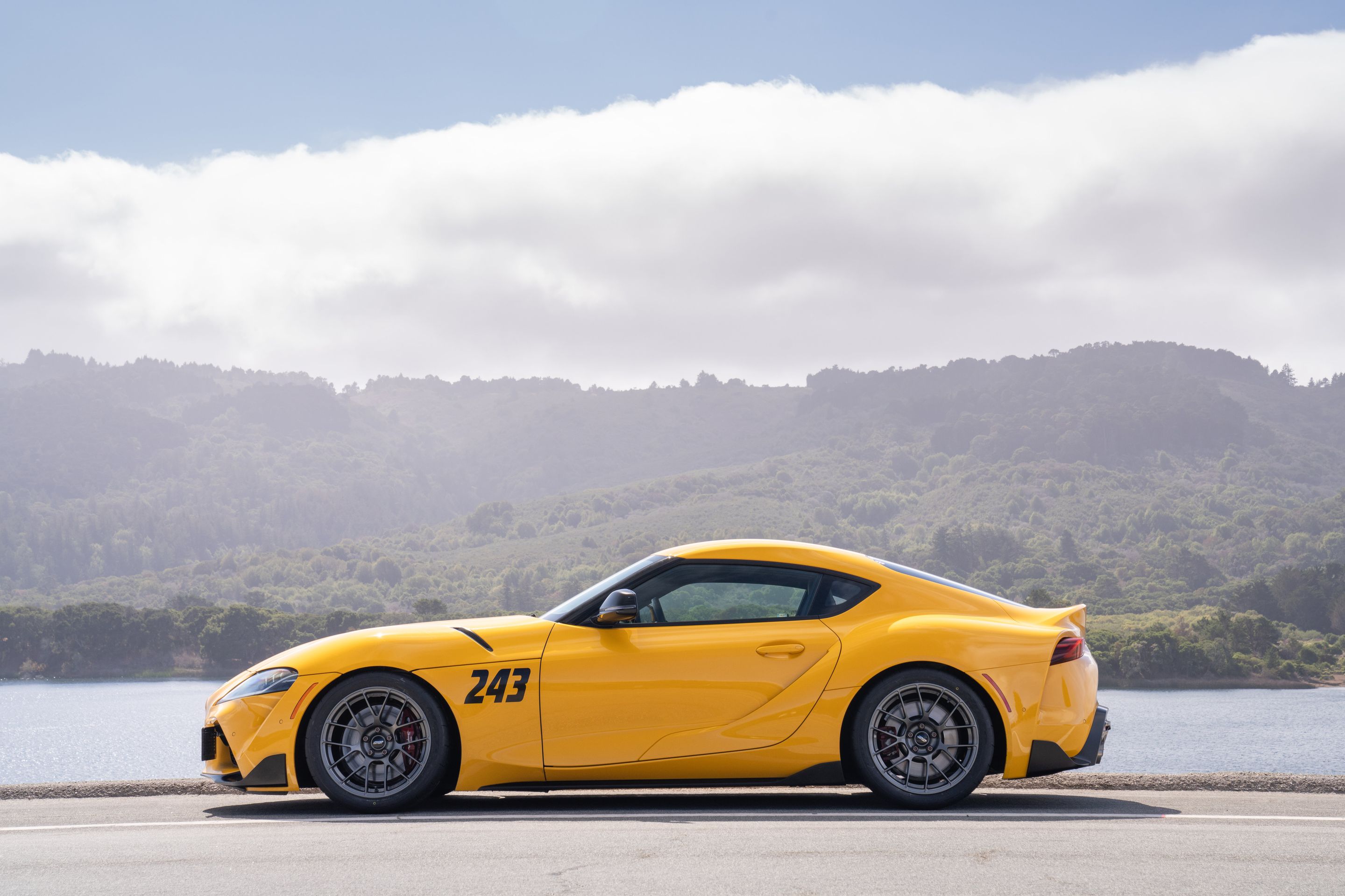 Yellow Toyota GR Supra with 18" EC-7RS Apex wheels in Anthracite