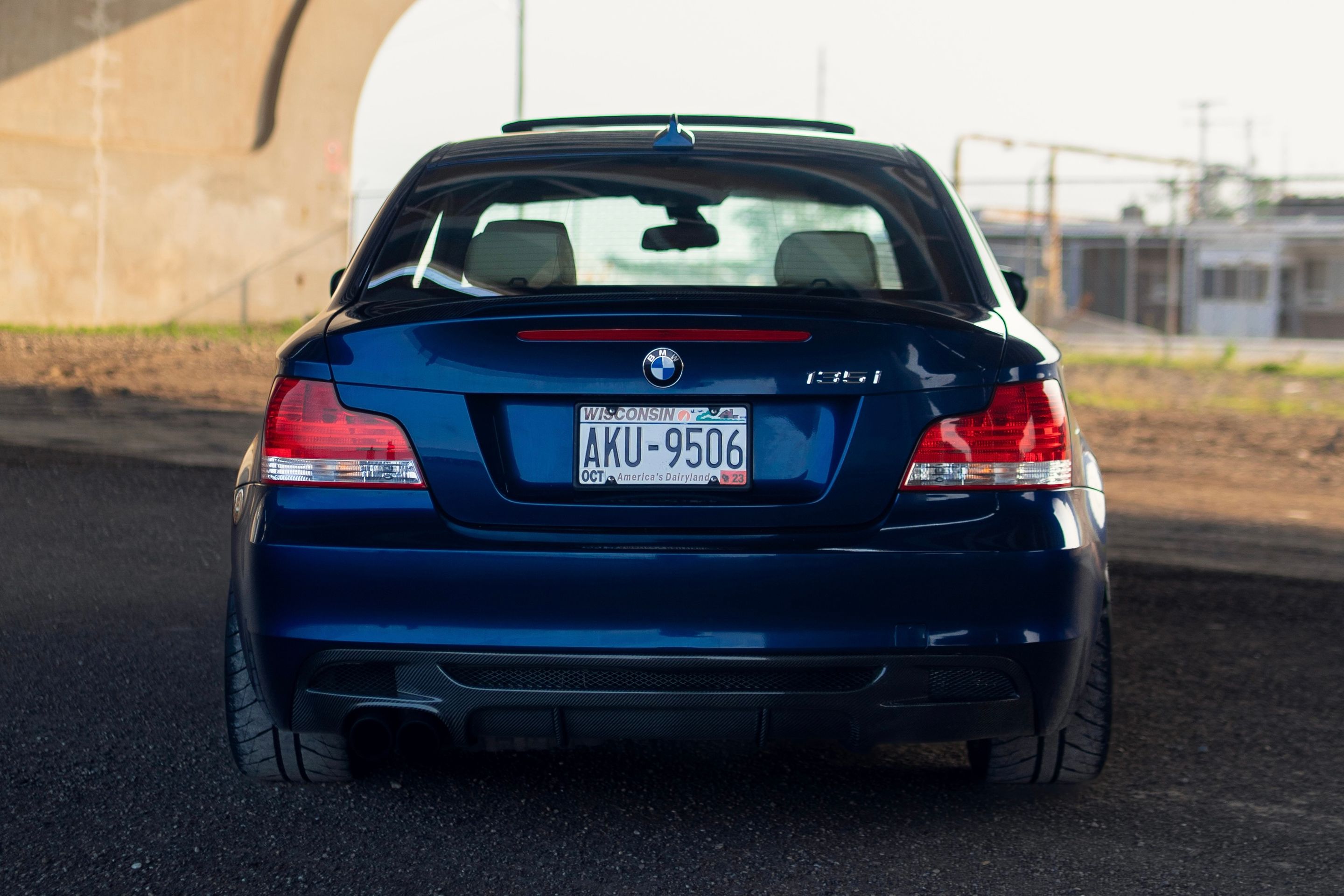 Blue BMW E82 Coupe 1 Series with 17" ARC-8 Apex wheels in Satin Black