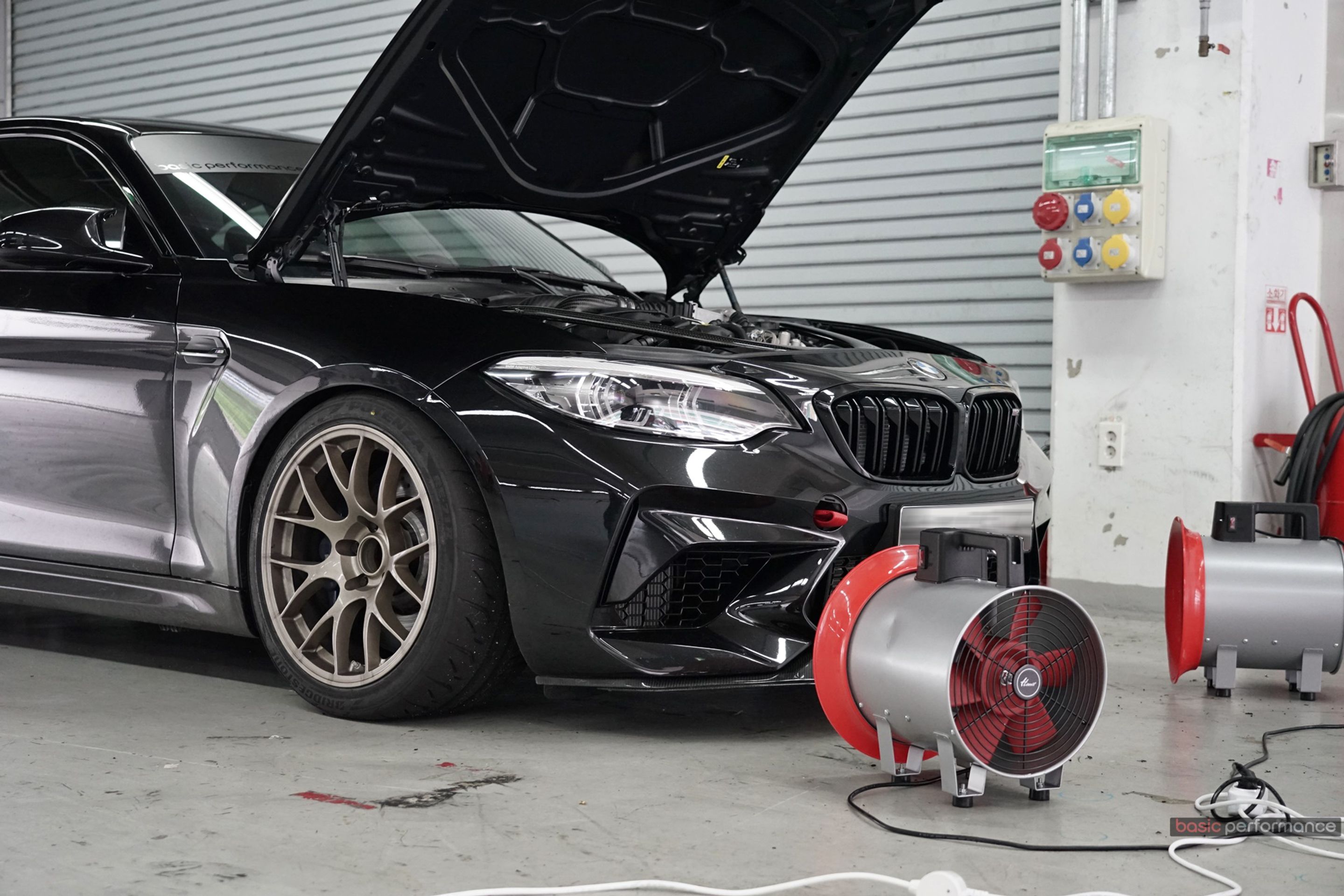 Black BMW F87 M2 with 18" EC-7 Apex wheels in Custom Finish