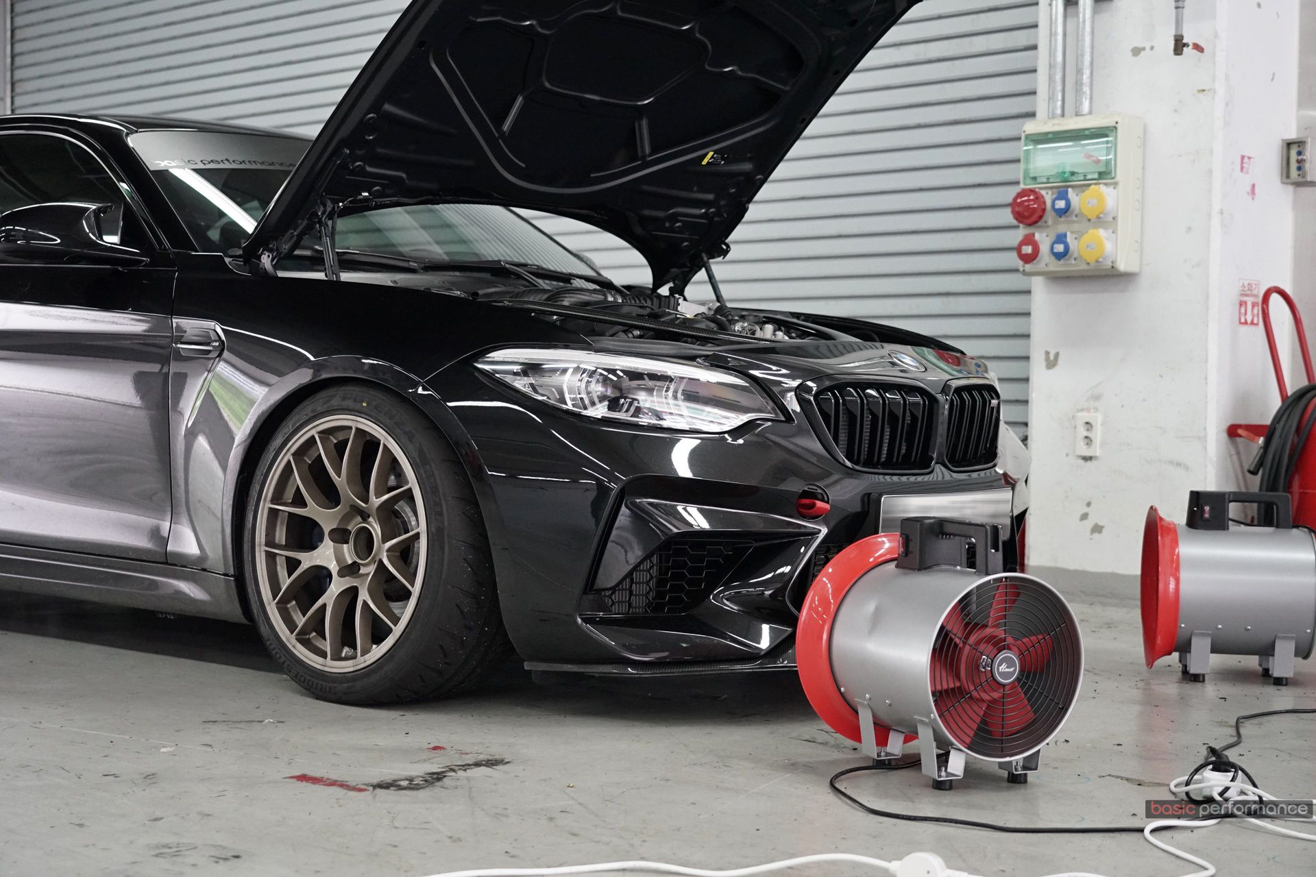 Black BMW F87 M2 with 18" EC-7 Apex wheels in Custom Finish