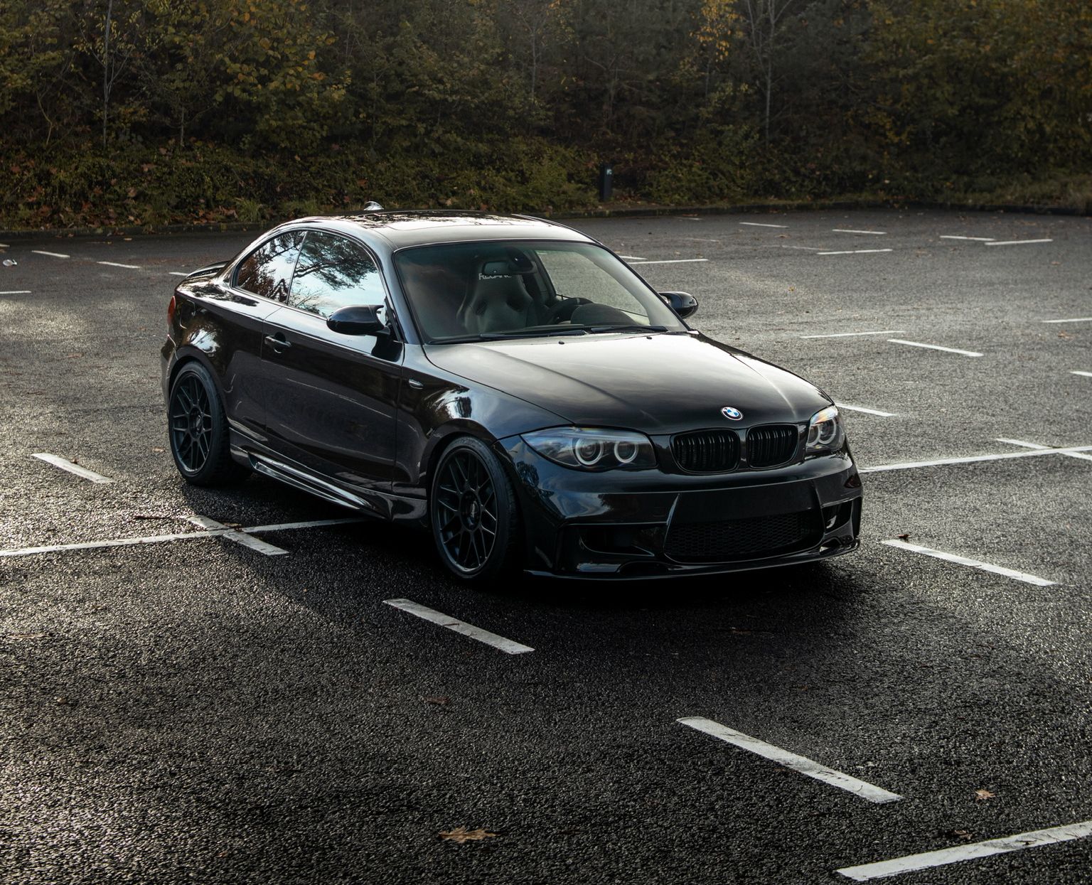 Black BMW E82 Coupe 1 Series with 18" ARC-8 Apex wheels in Satin Black