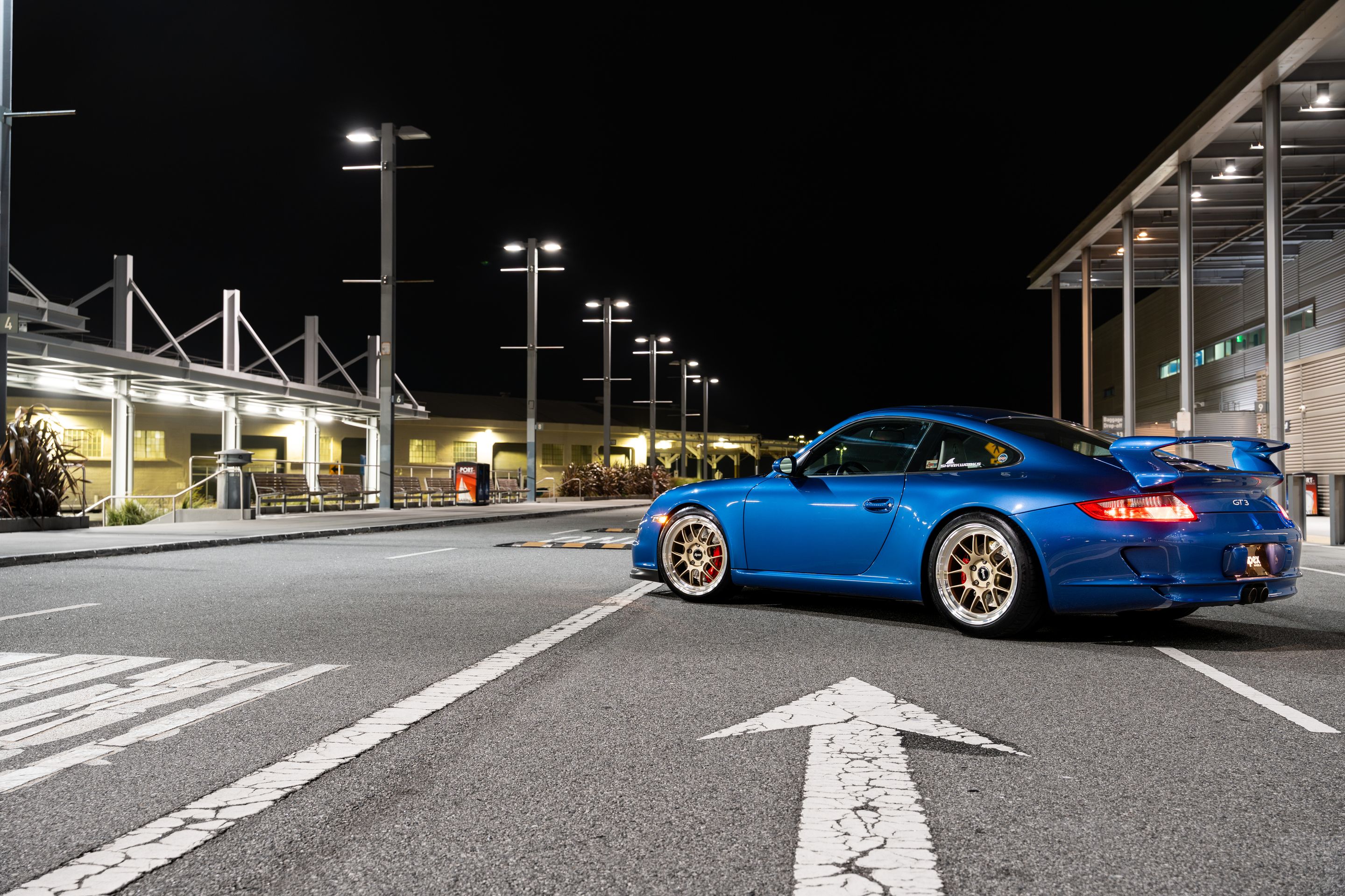Blue Porsche 911 997 GT3 with 19" TEST-M Apex wheels in Machined Lip Gloss Motorsport Gold