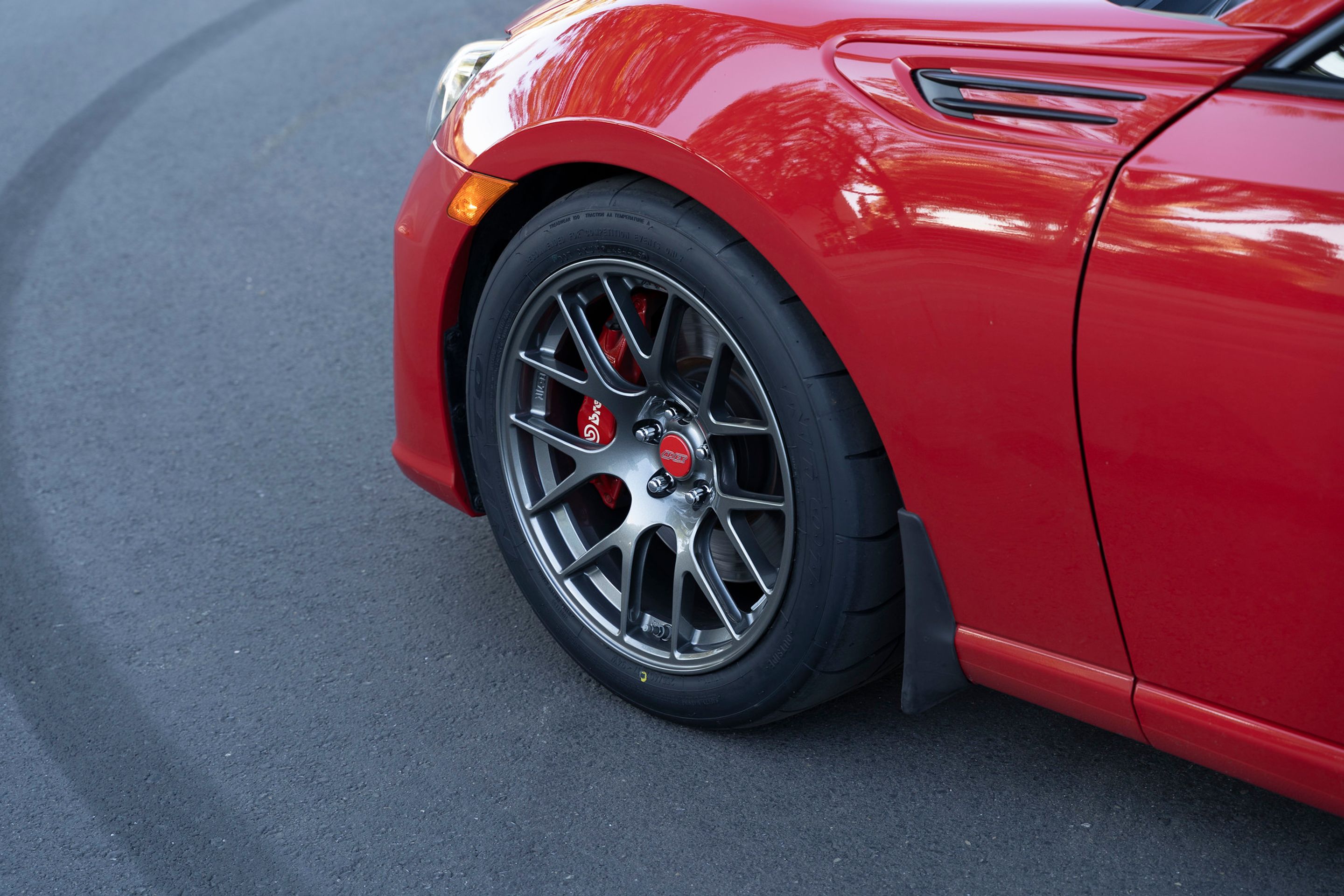 Red Subaru ZC6 / Gen 1 BRZ with 17" EC-7R Apex wheels in Anthracite
