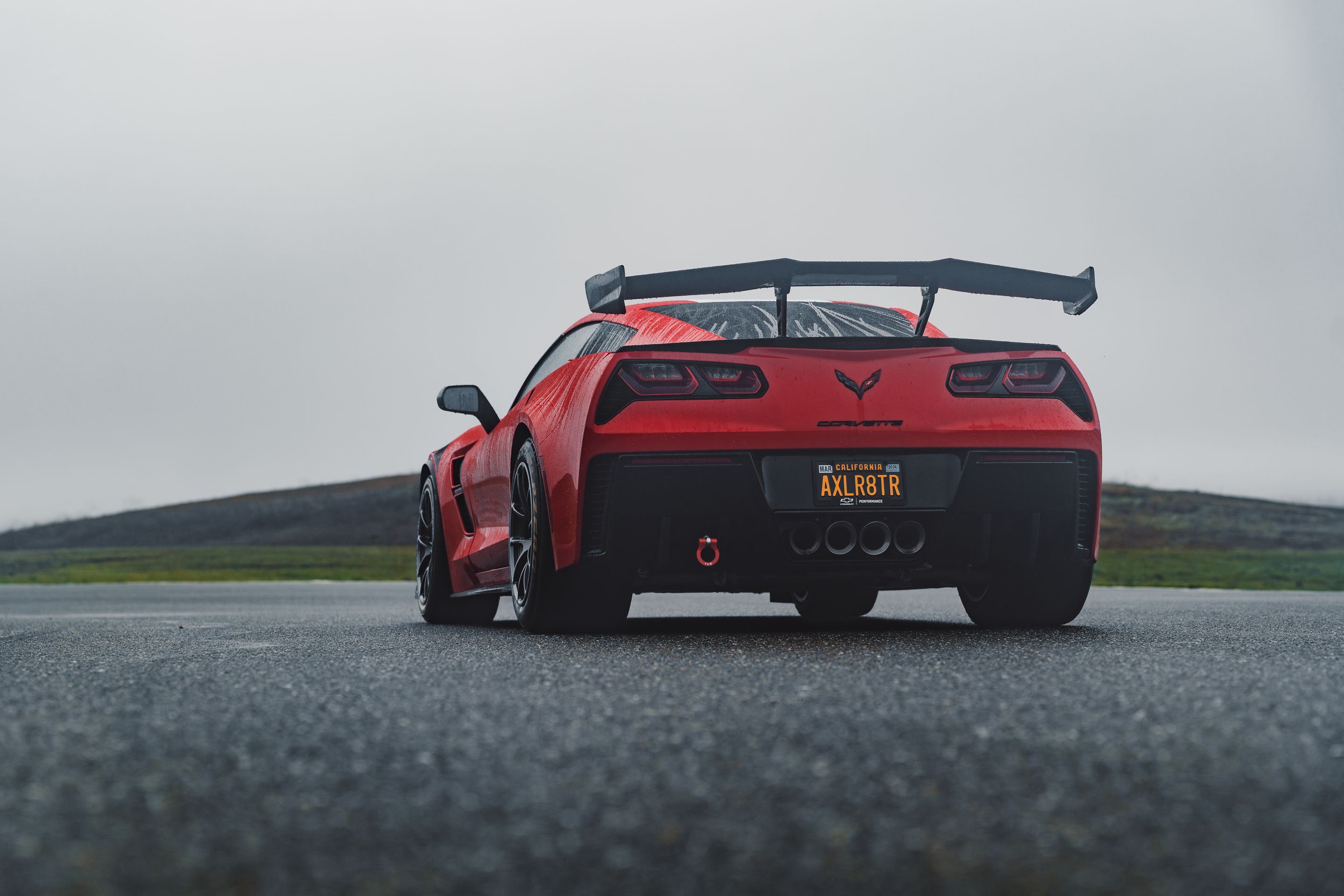Red Chevrolet C7 Corvette Grand Sport with 18" VS-5RE Apex wheels in Anthracite