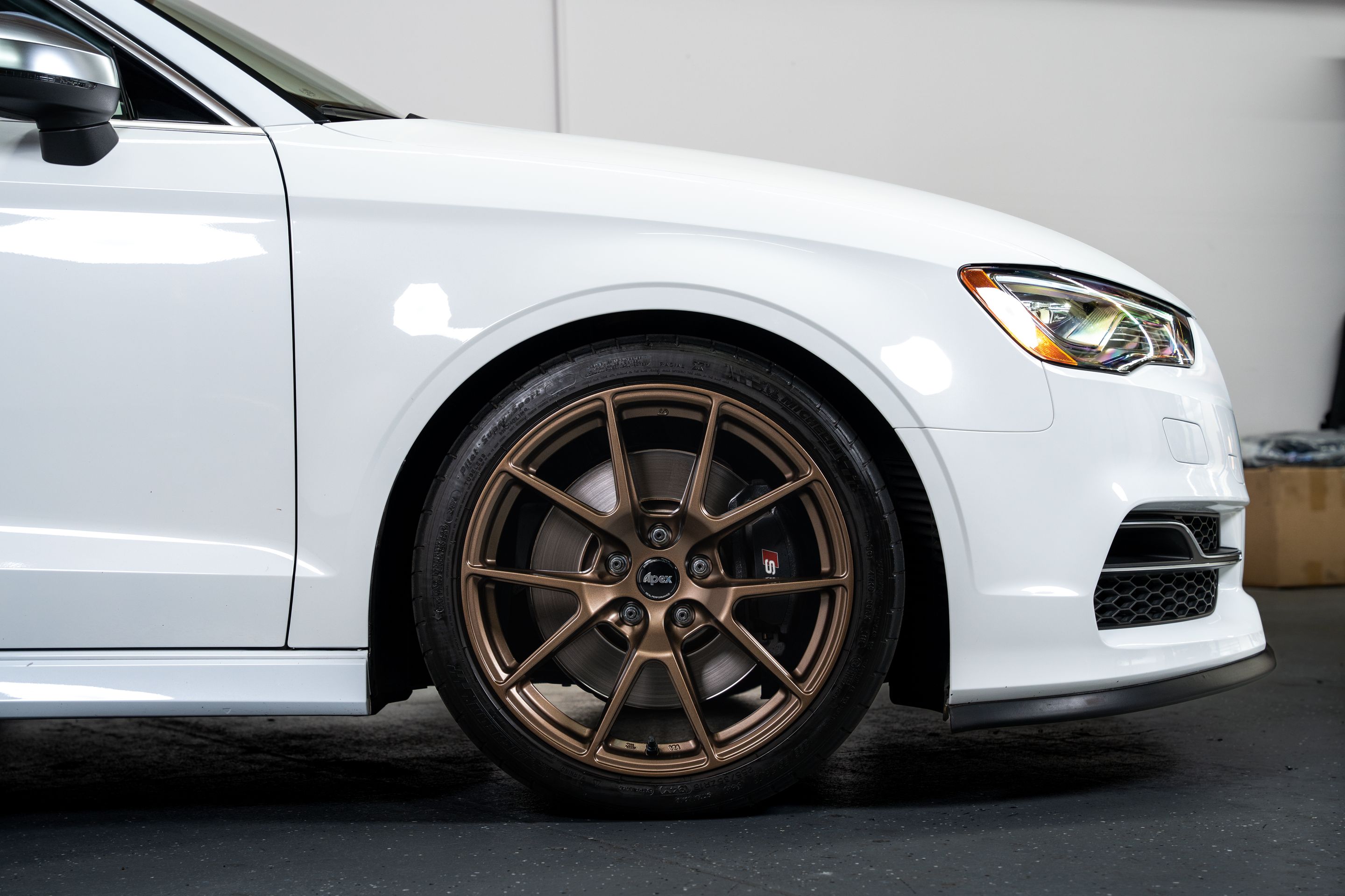 White Audi 8V S3 with 18" VS-5 Apex wheels in Satin Bronze