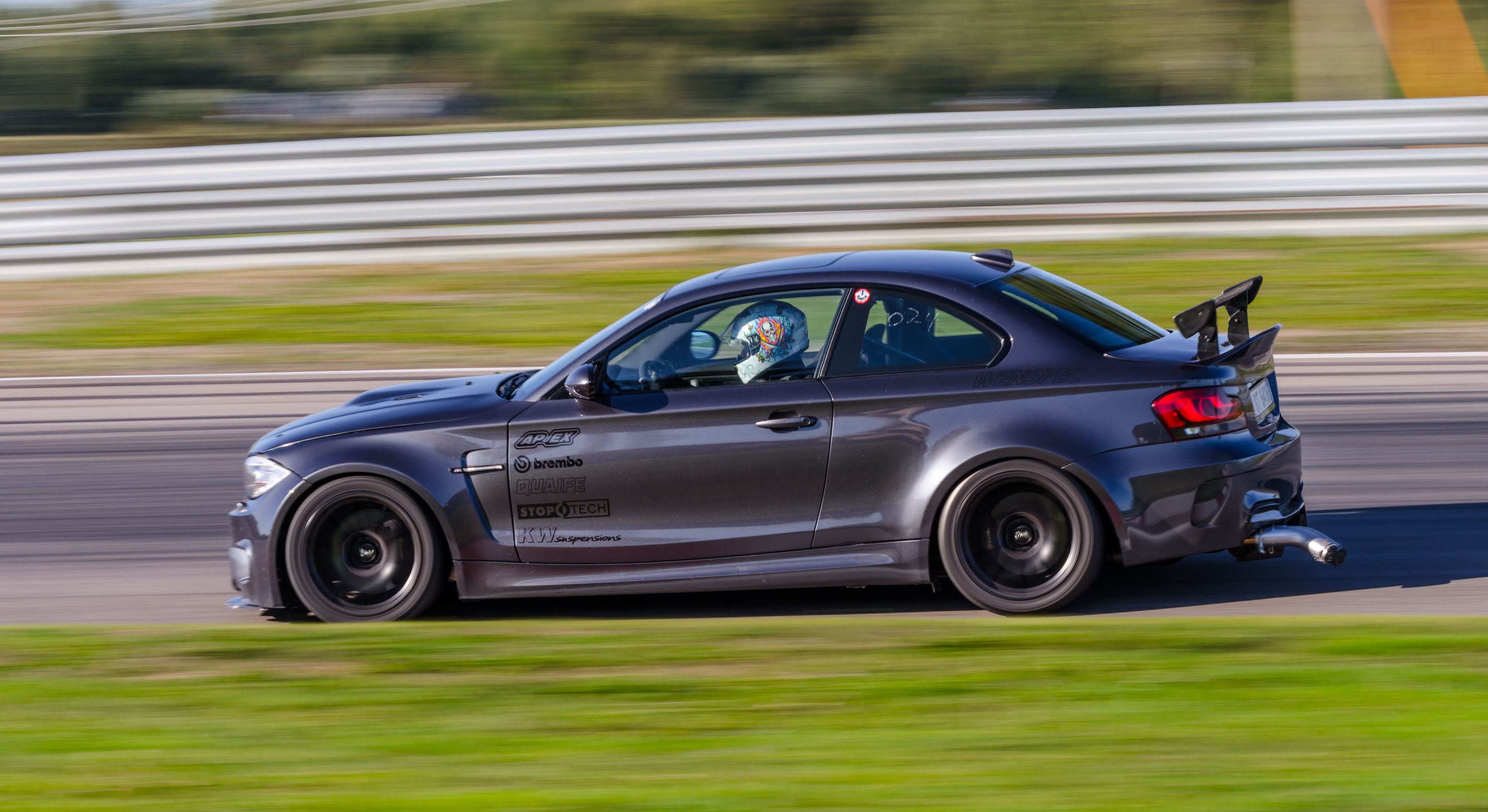Grey BMW E82 1M with 18" SM-10 Apex wheels in Satin Black