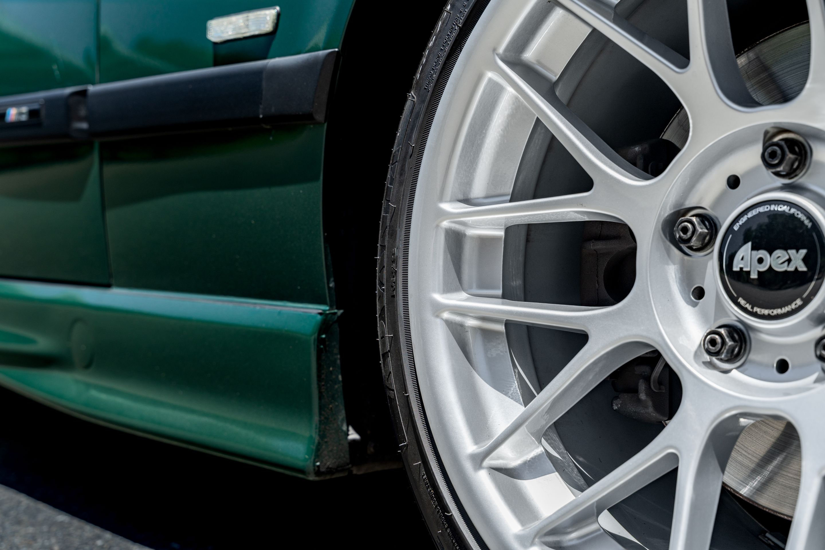 Green BMW E36 M3 with 17" ARC-8 Apex wheels in Race Silver